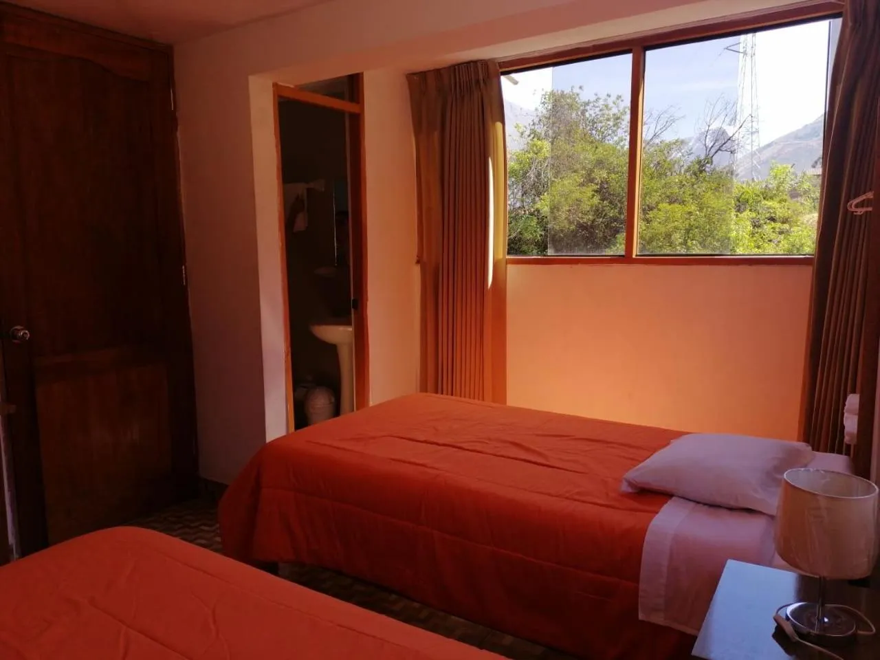 Bed in Tambo de Ollantay Hotel