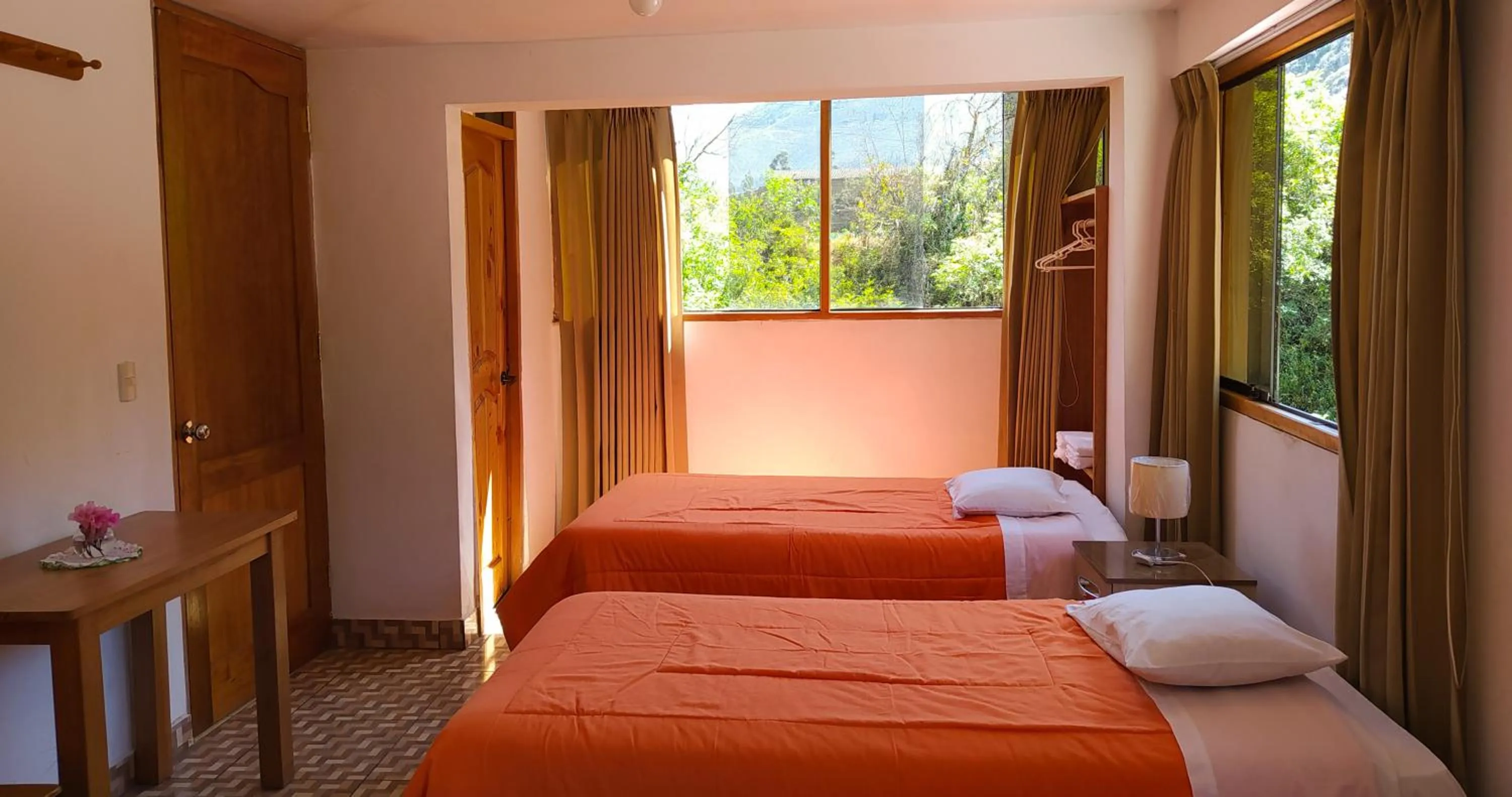 Bed in Tambo de Ollantay Hotel