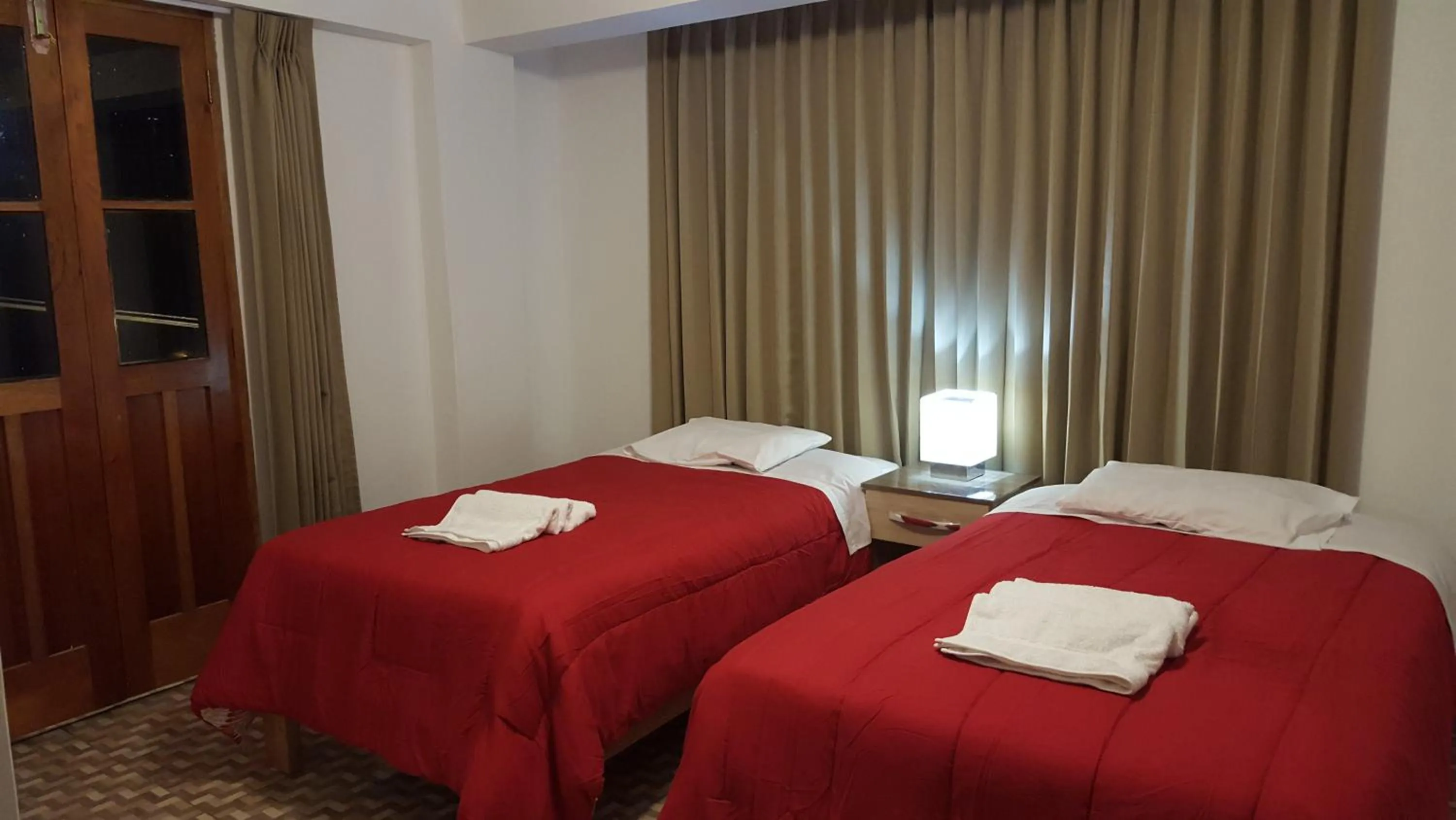 Photo of the whole room, Bed in Tambo de Ollantay Hotel