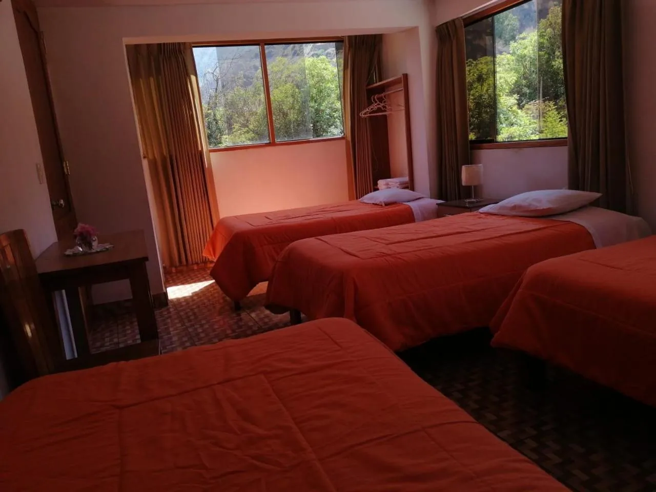 Bed in Tambo de Ollantay Hotel