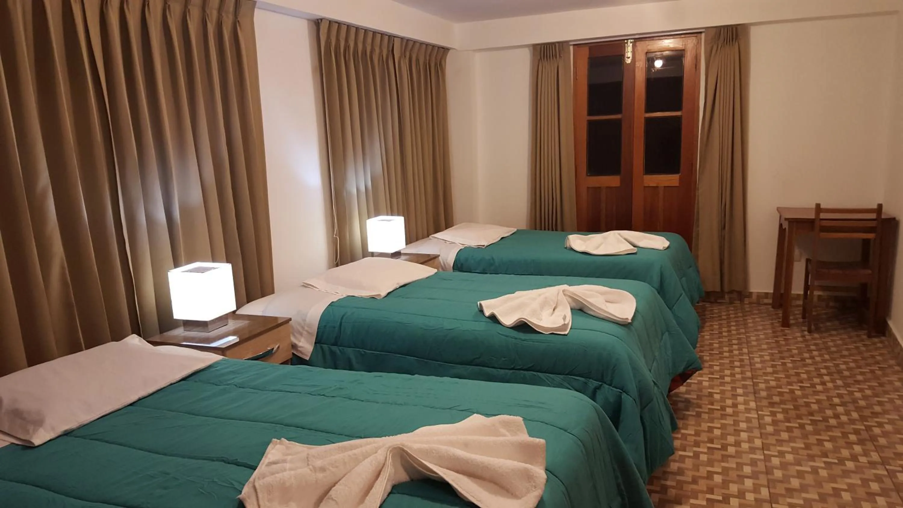 Photo of the whole room, Bed in Tambo de Ollantay Hotel