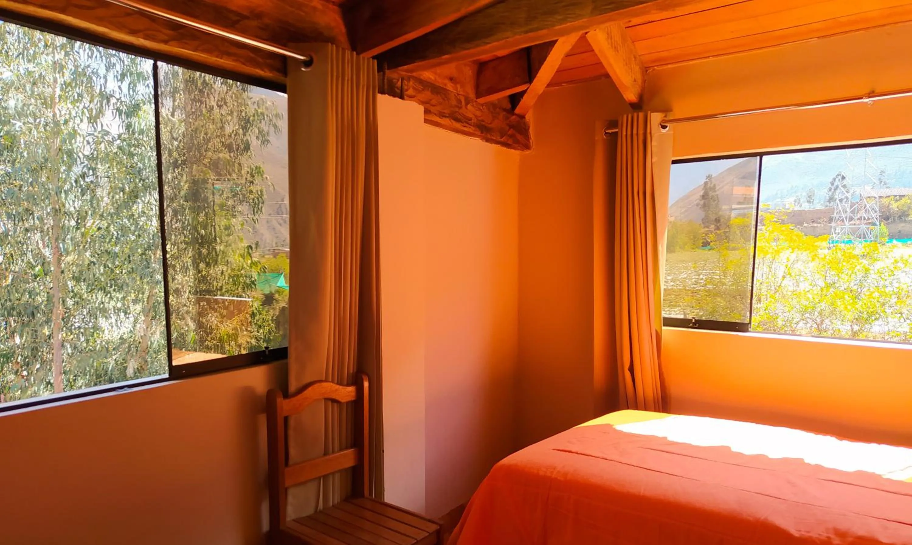 Bed in Tambo de Ollantay Hotel