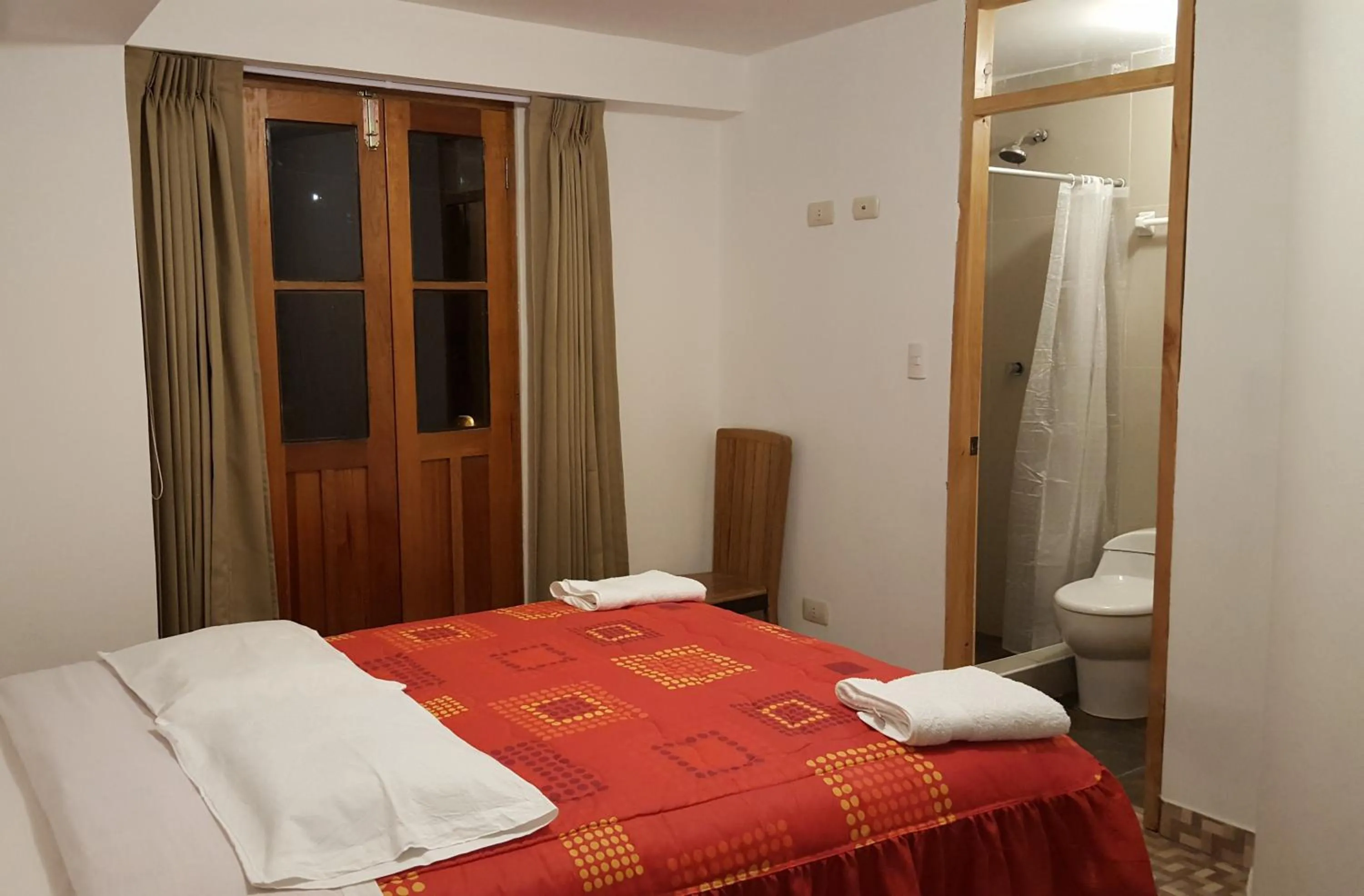 Photo of the whole room, Bed in Tambo de Ollantay Hotel