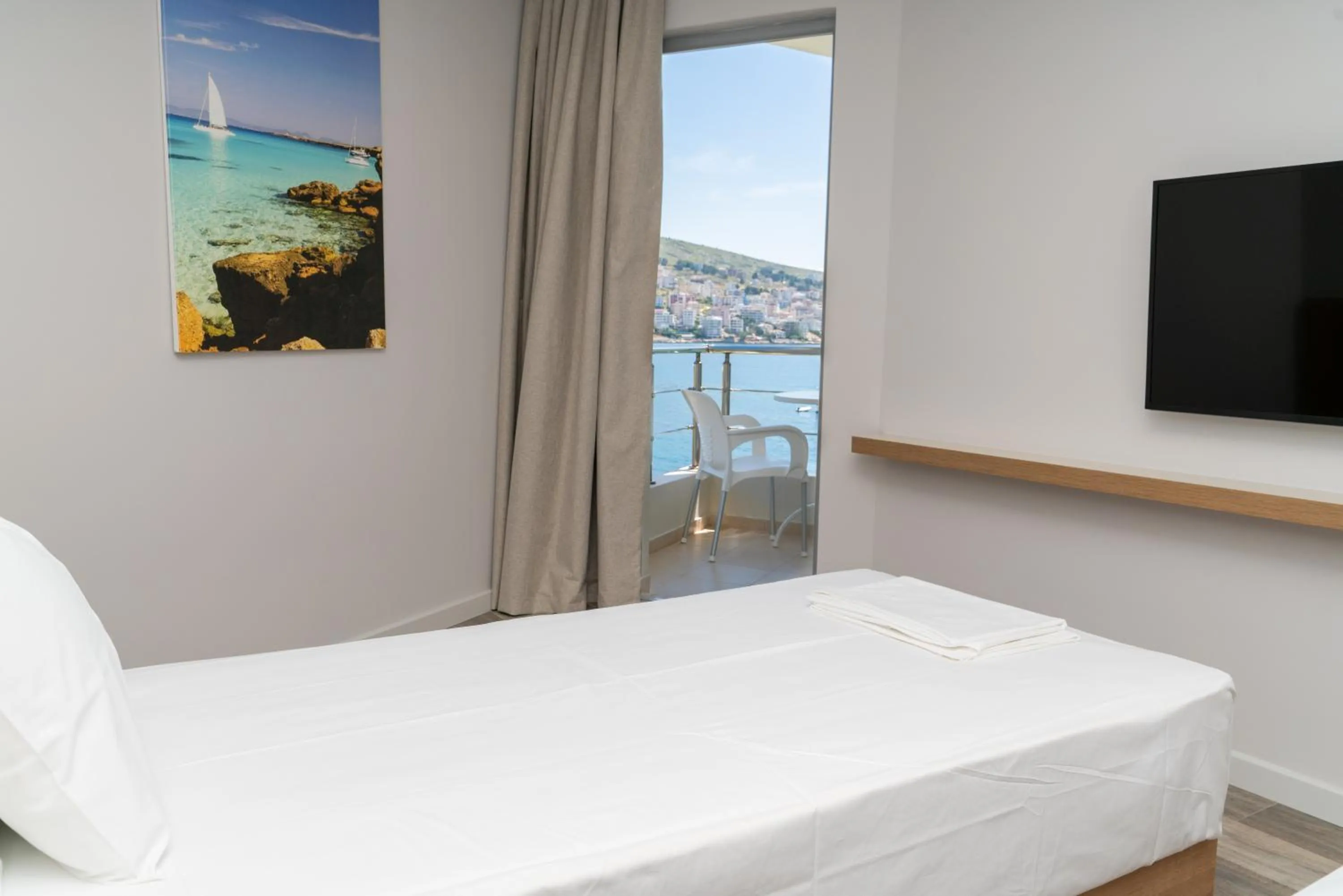 Bed in Titania Hotel