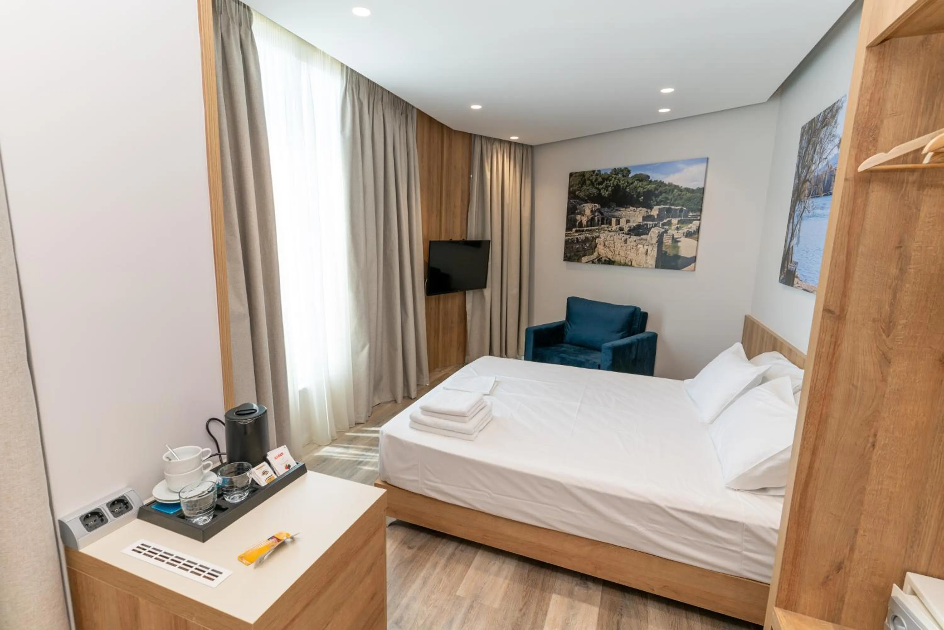 Bed in Titania Hotel