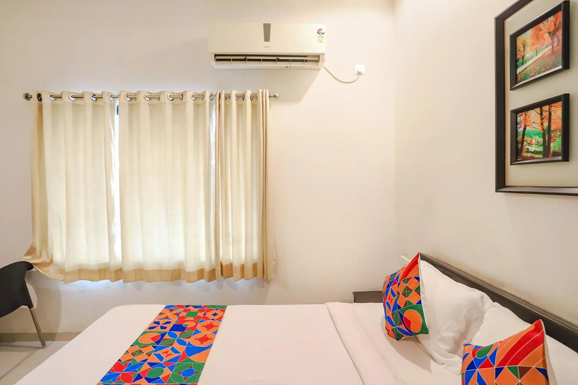 Bed in FabHotel Archanil Apartment - Sitanagar Cricket Ground