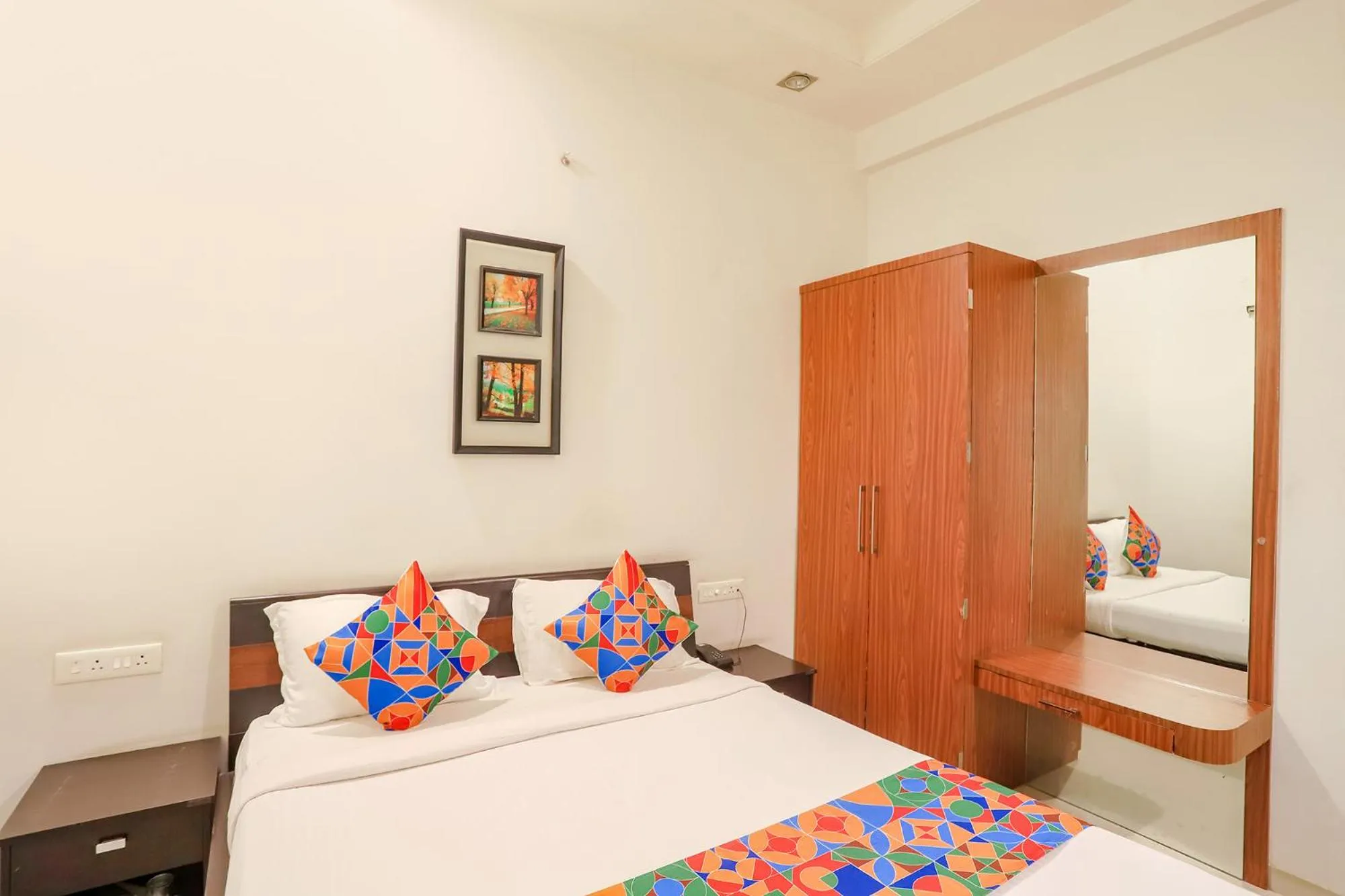 Bed in FabHotel Archanil Apartment - Sitanagar Cricket Ground