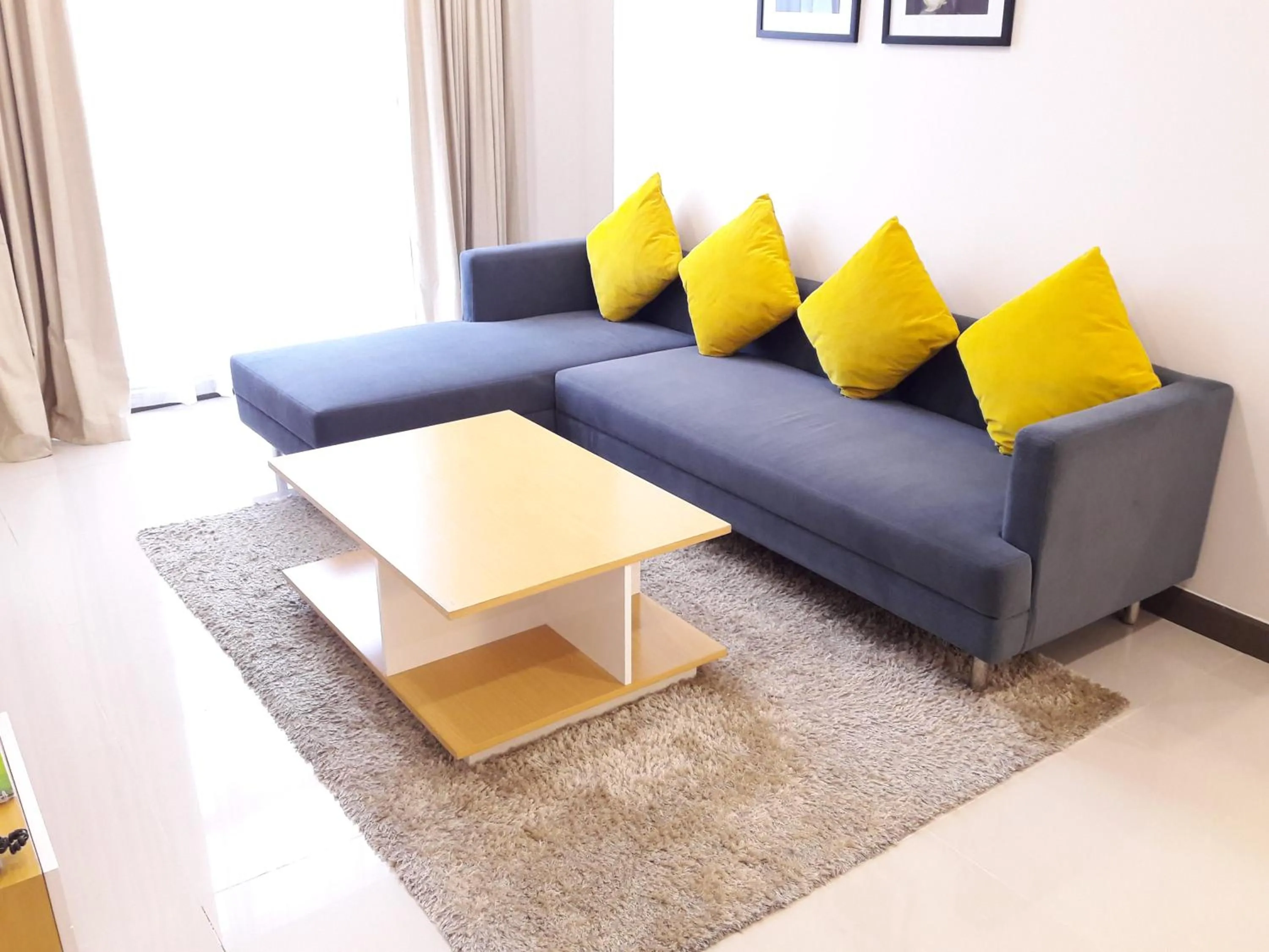 Living room in Bluesky Serviced Apartment Airport Plaza