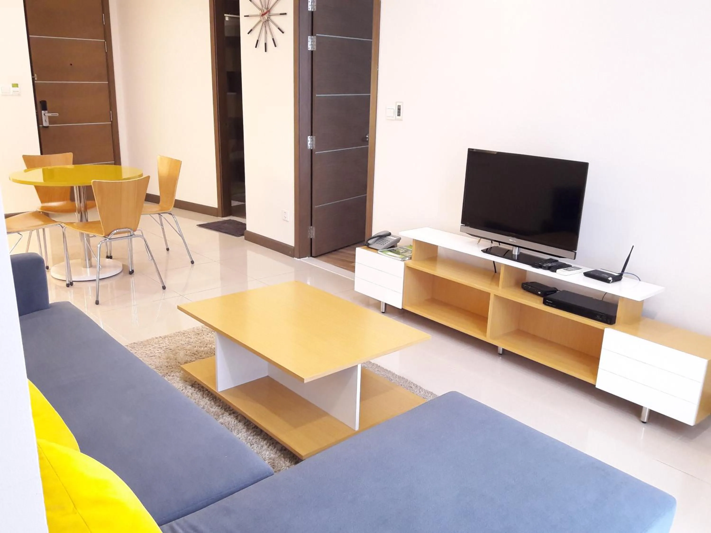 Living room in Bluesky Serviced Apartment Airport Plaza