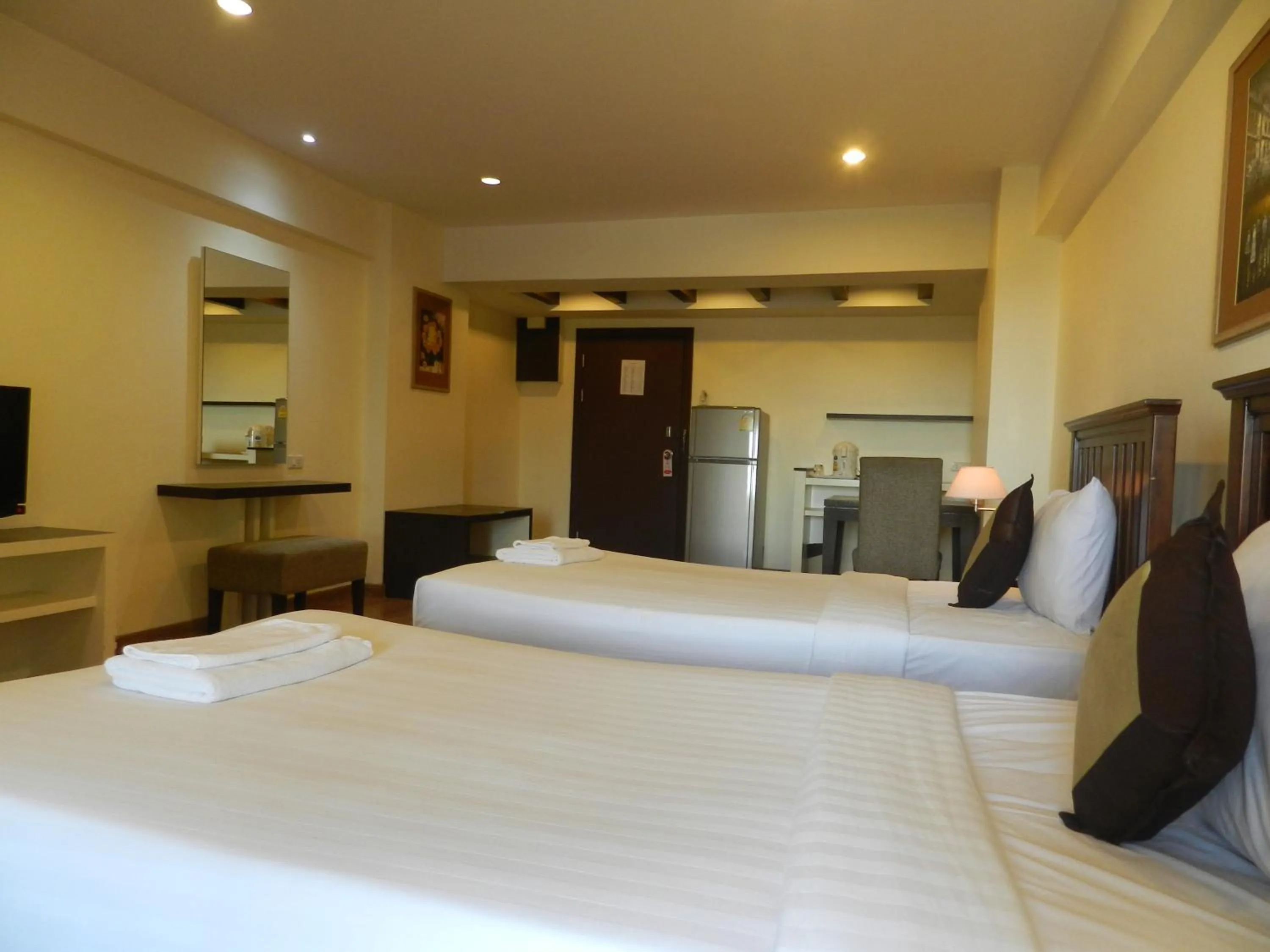 Bed in Nanatai Suites