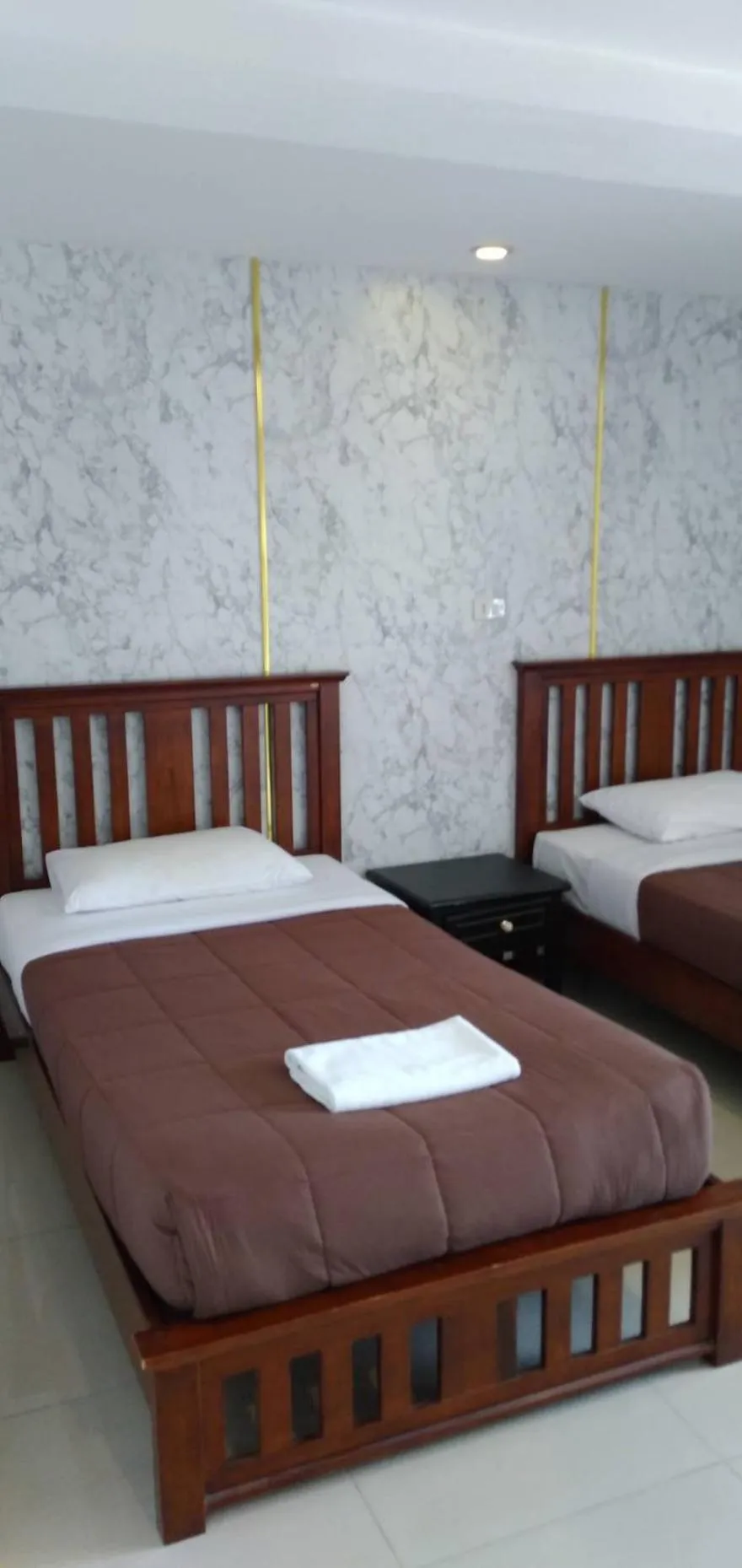 Bed in Nanatai Suites