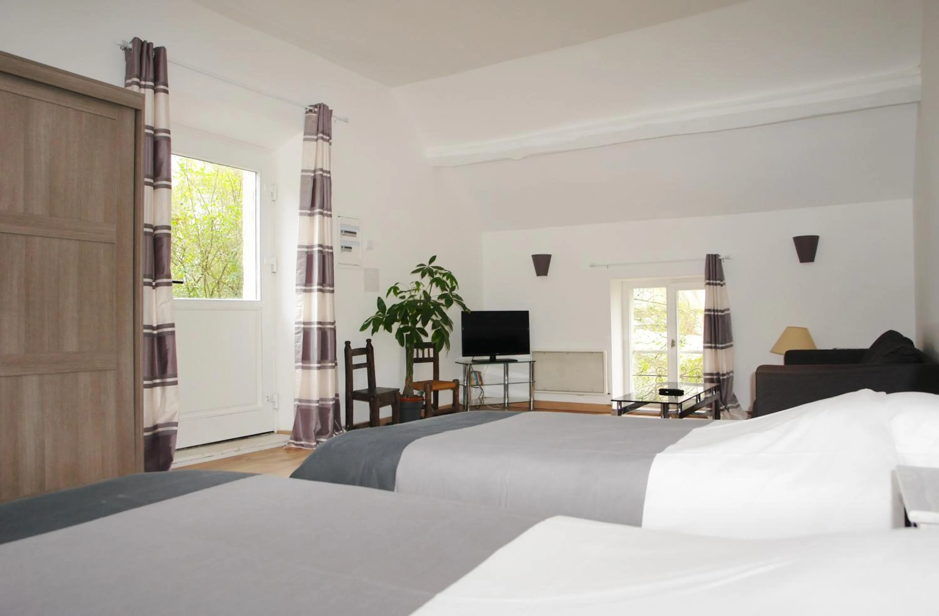 Photo of the whole room, Bed in Domaine De Marguerite