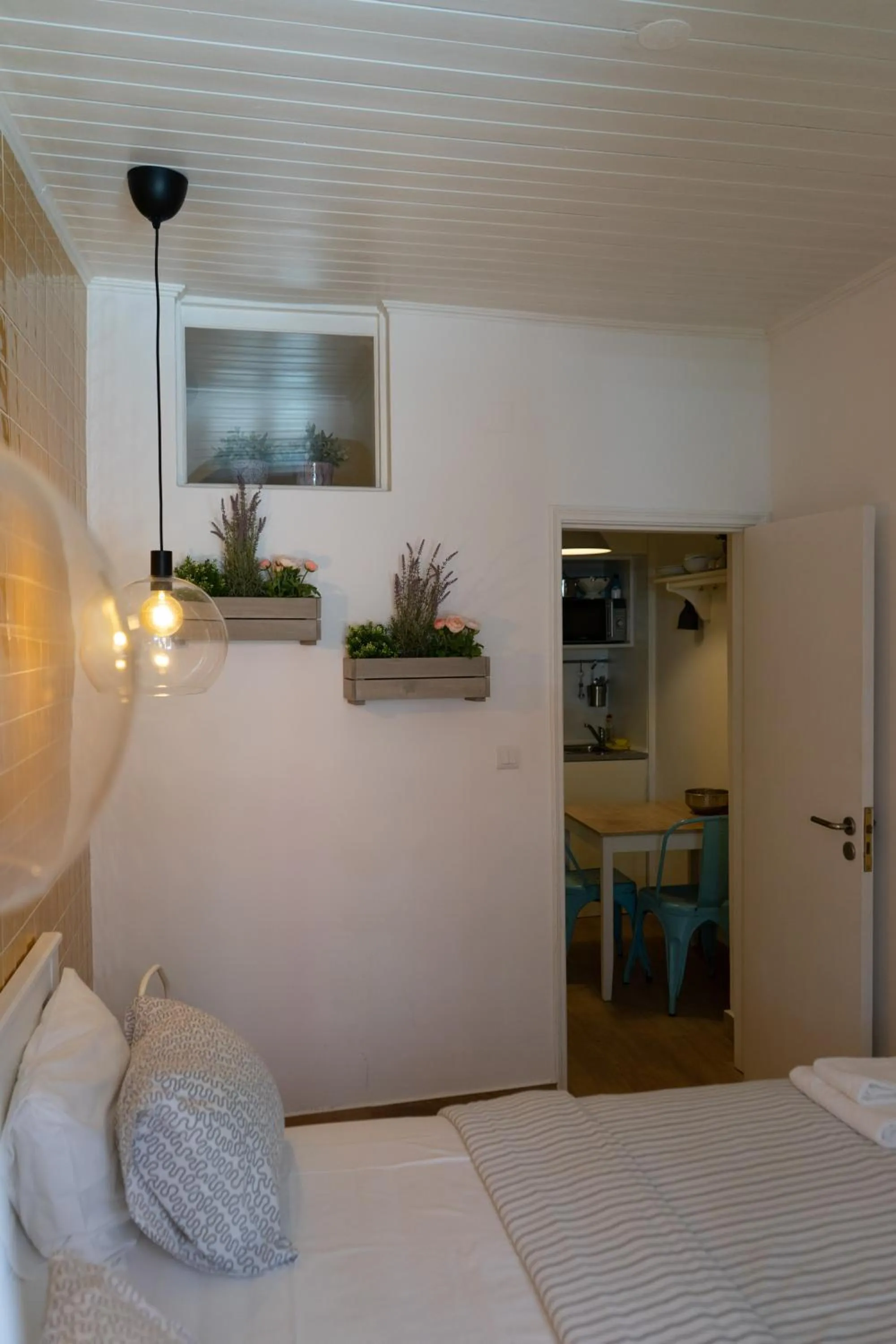 Bed in Flores Guest House