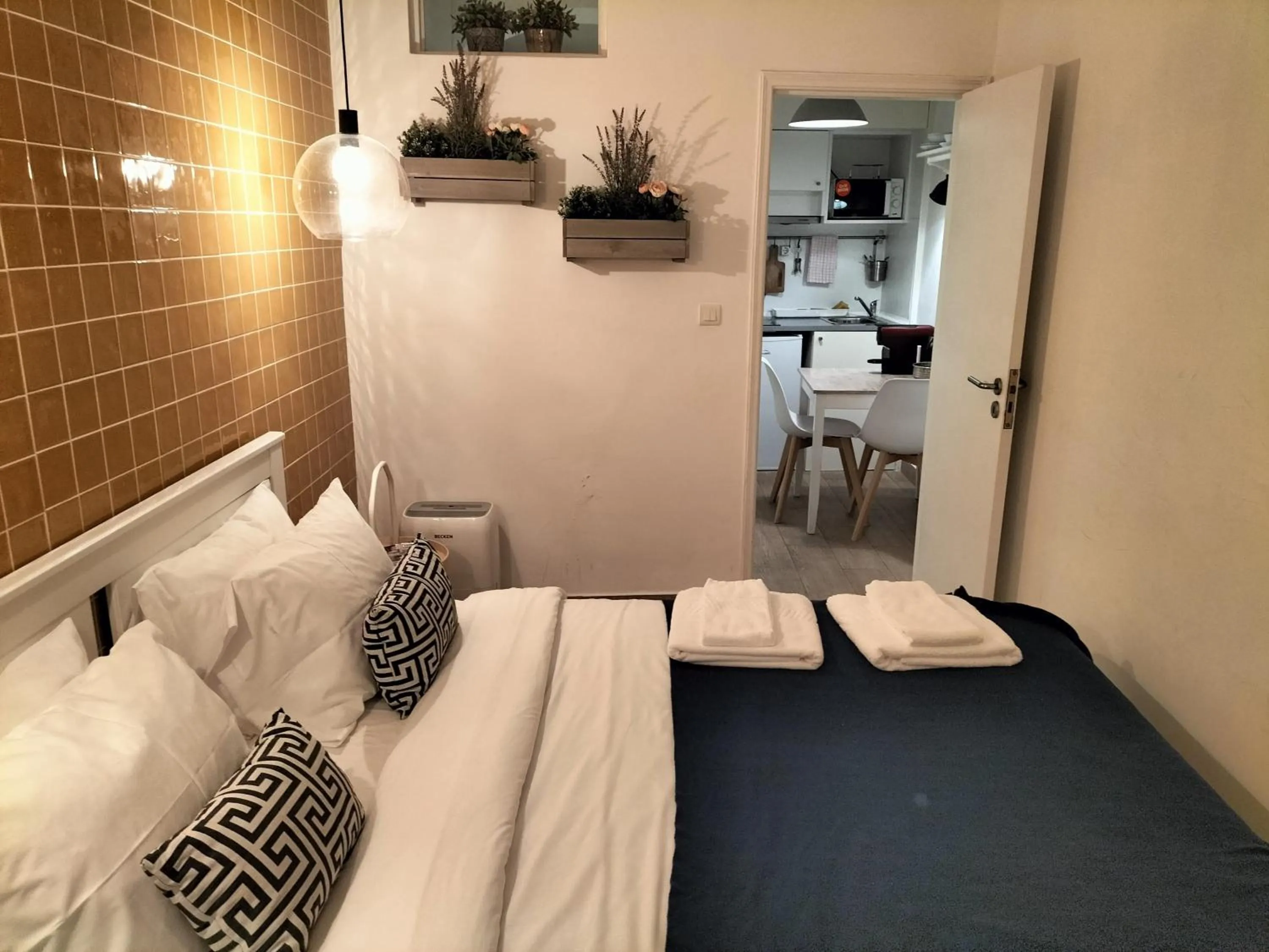 Bed in Flores Guest House