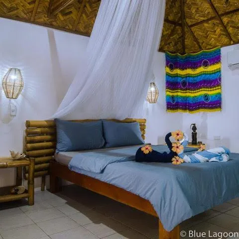 Bed in Blue Lagoon Dive Resort