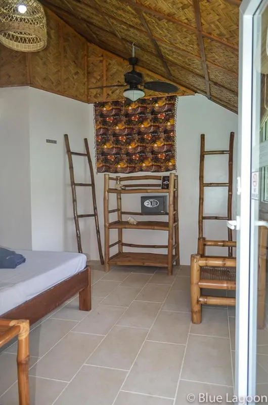 Bed in Blue Lagoon Dive Resort