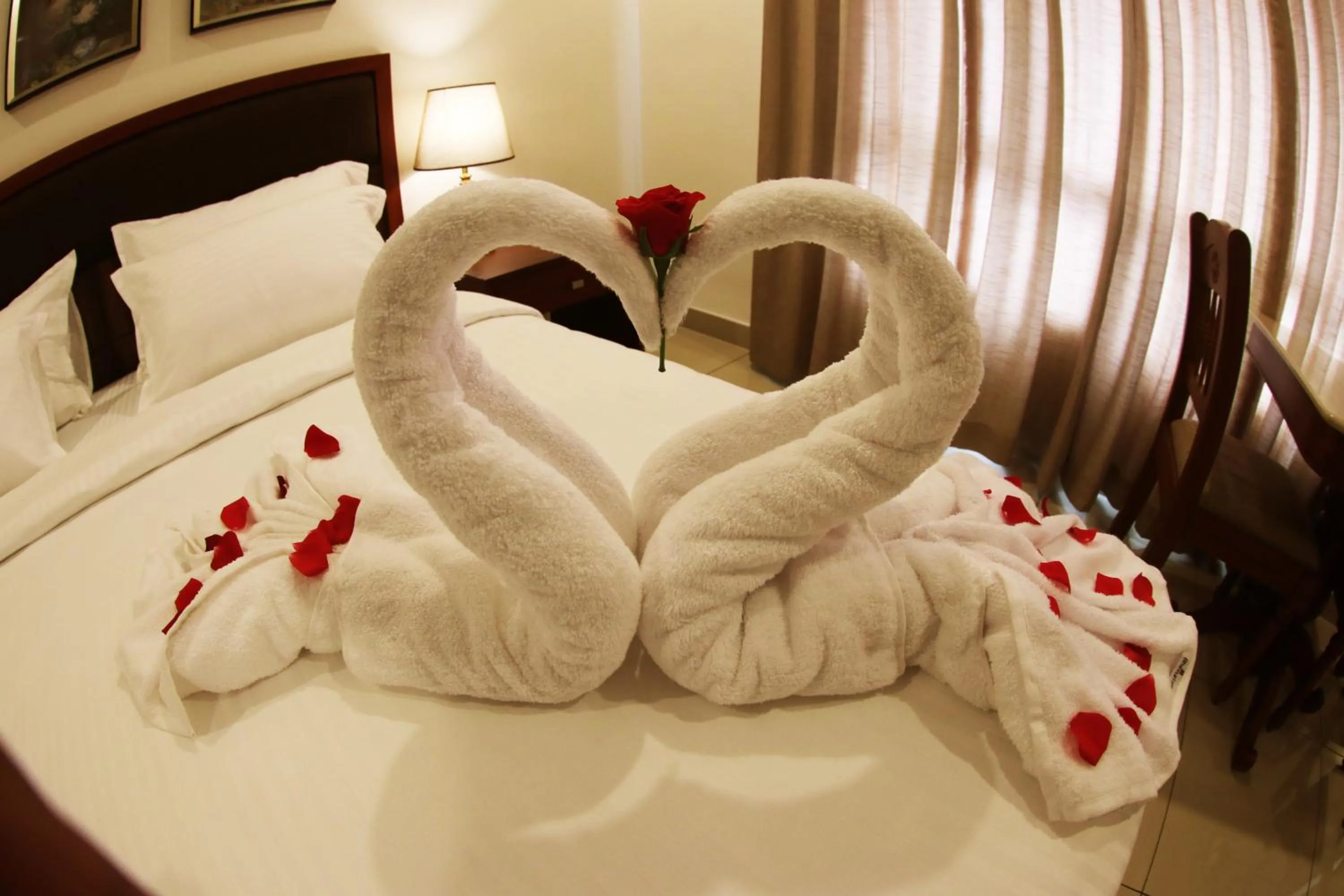 Bed in Bhasuri Inn Guruvayoor