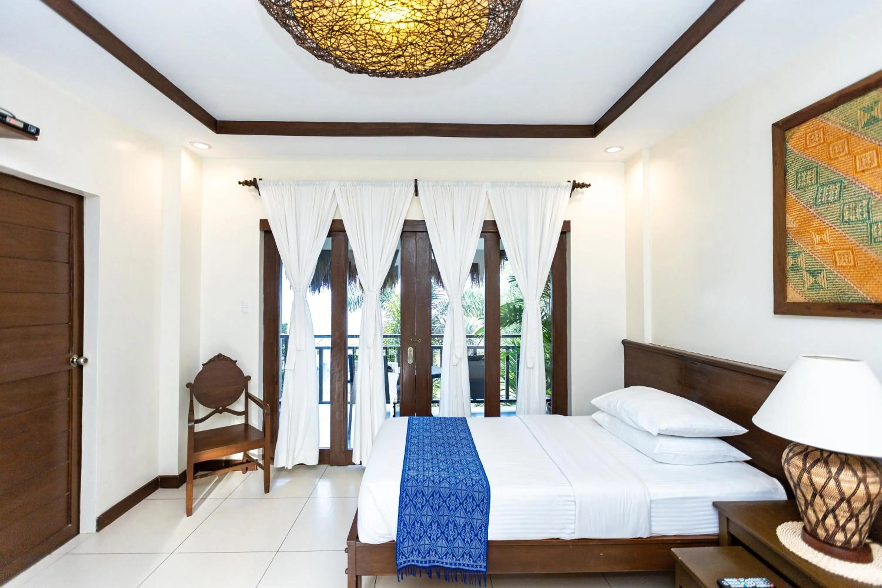 Bed in Azure Dive Resort