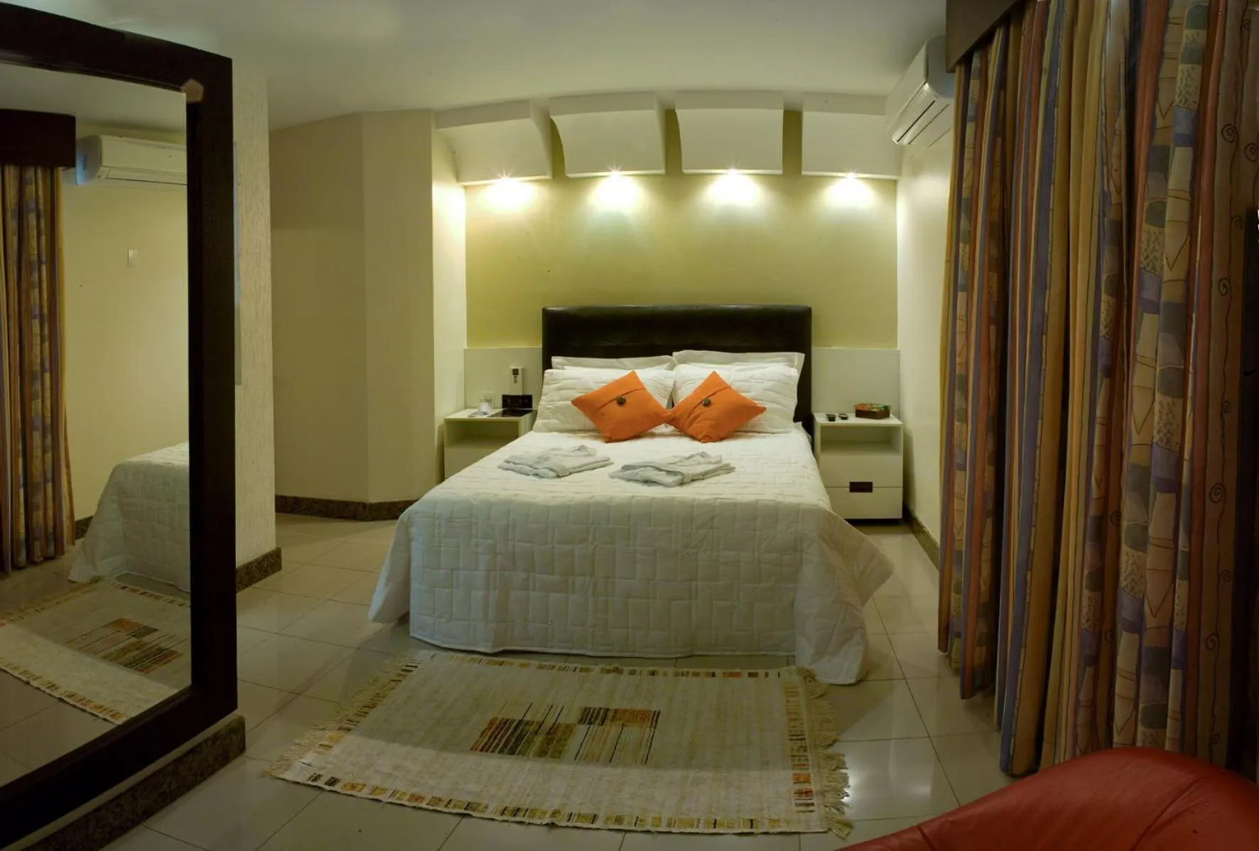 Bed in Benvenuto Palace Hotel