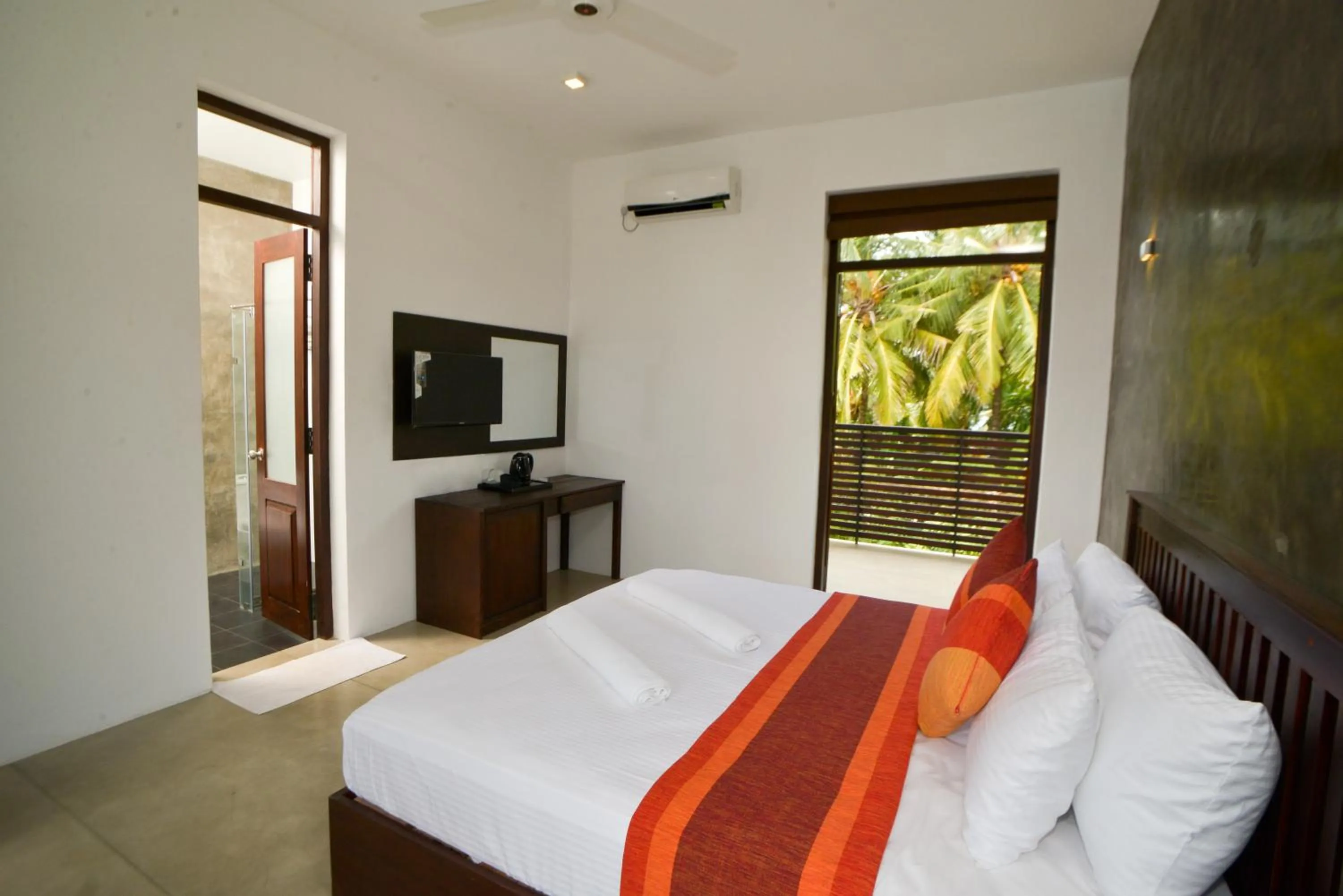 Bed in Olanro Hotel Negombo