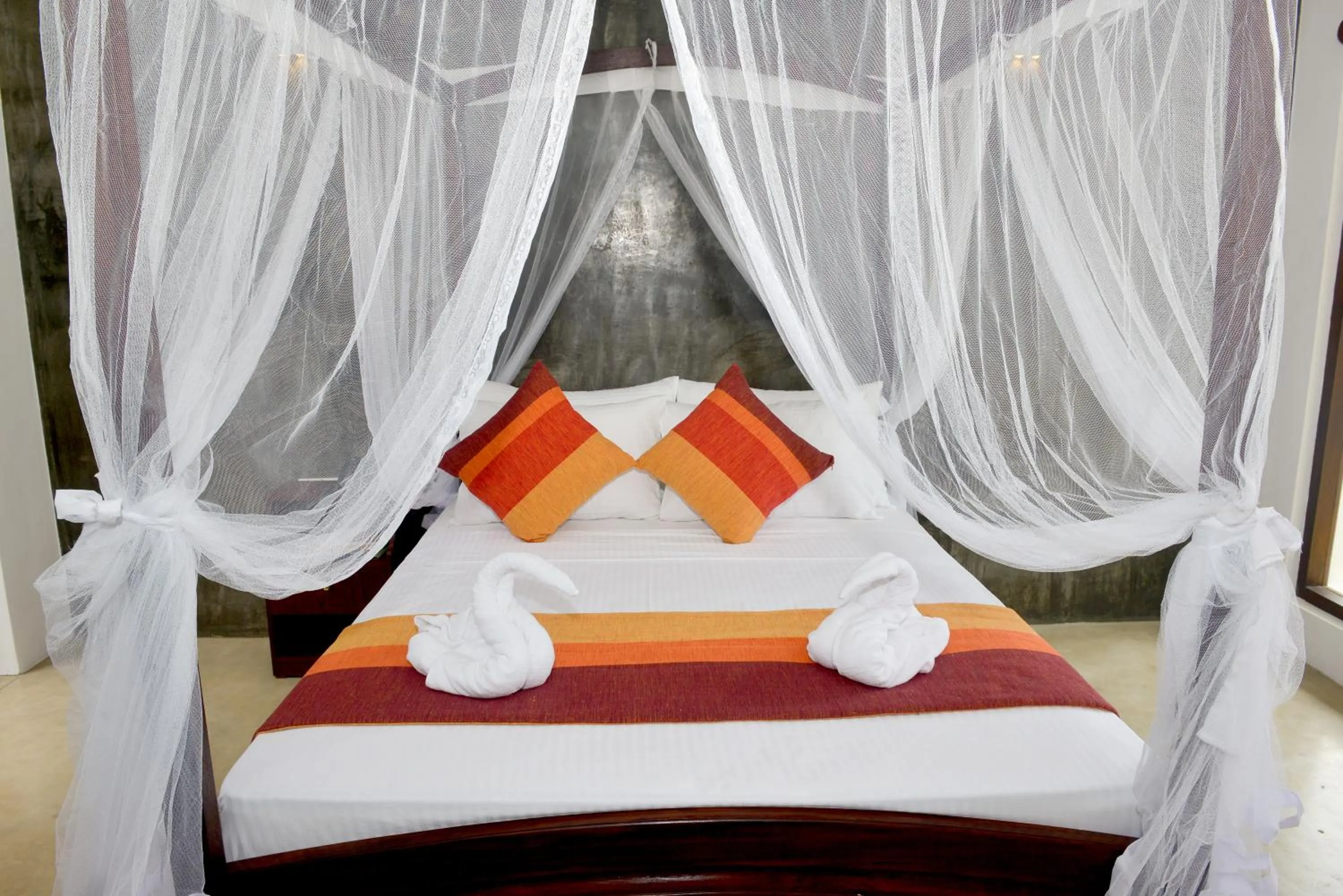 Bed in Olanro Hotel Negombo