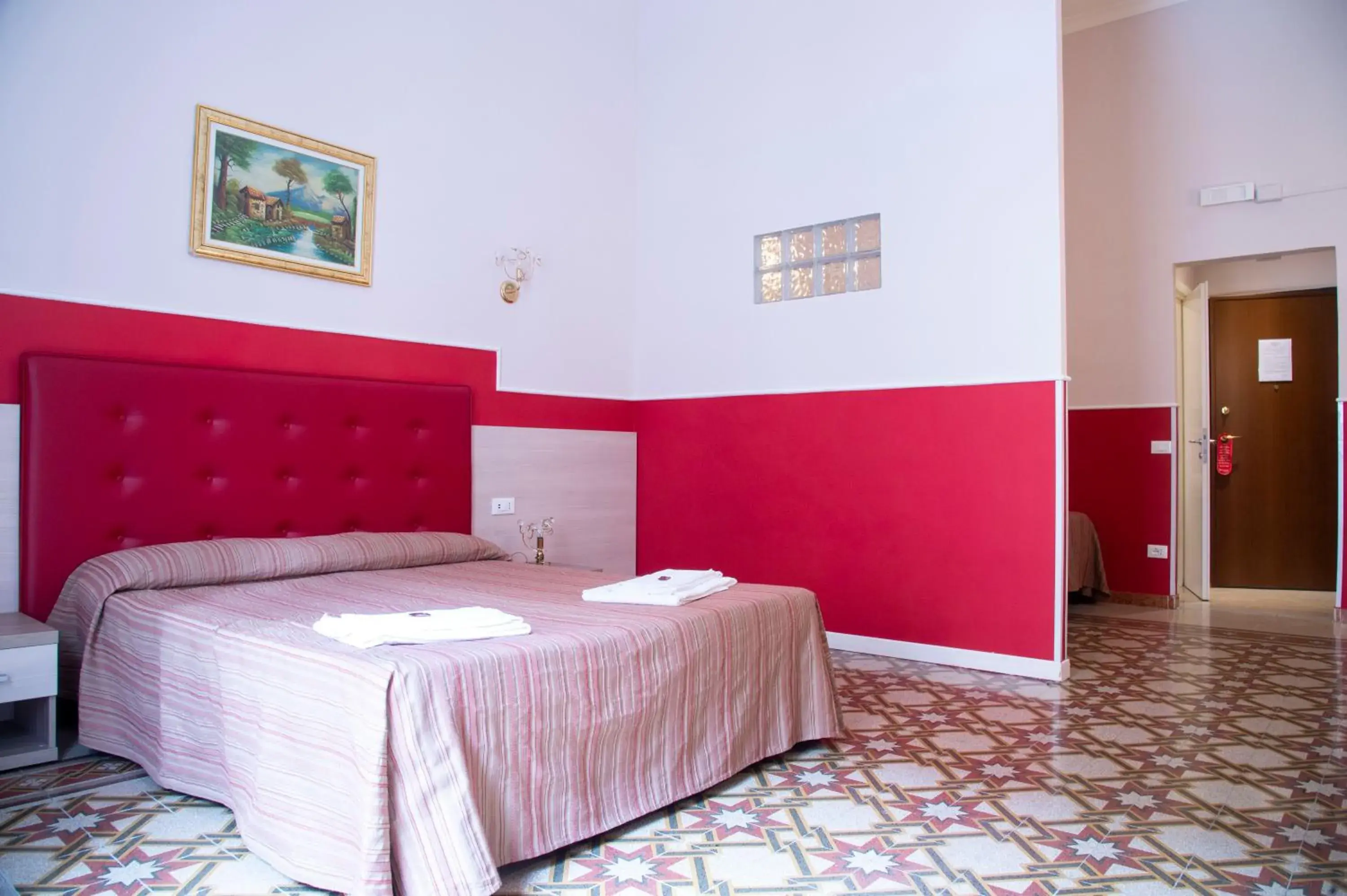 Quadruple Room with Private Bathroom in Domus Napoleone Quadruple Room with Private Bathroom in Domus Napoleone