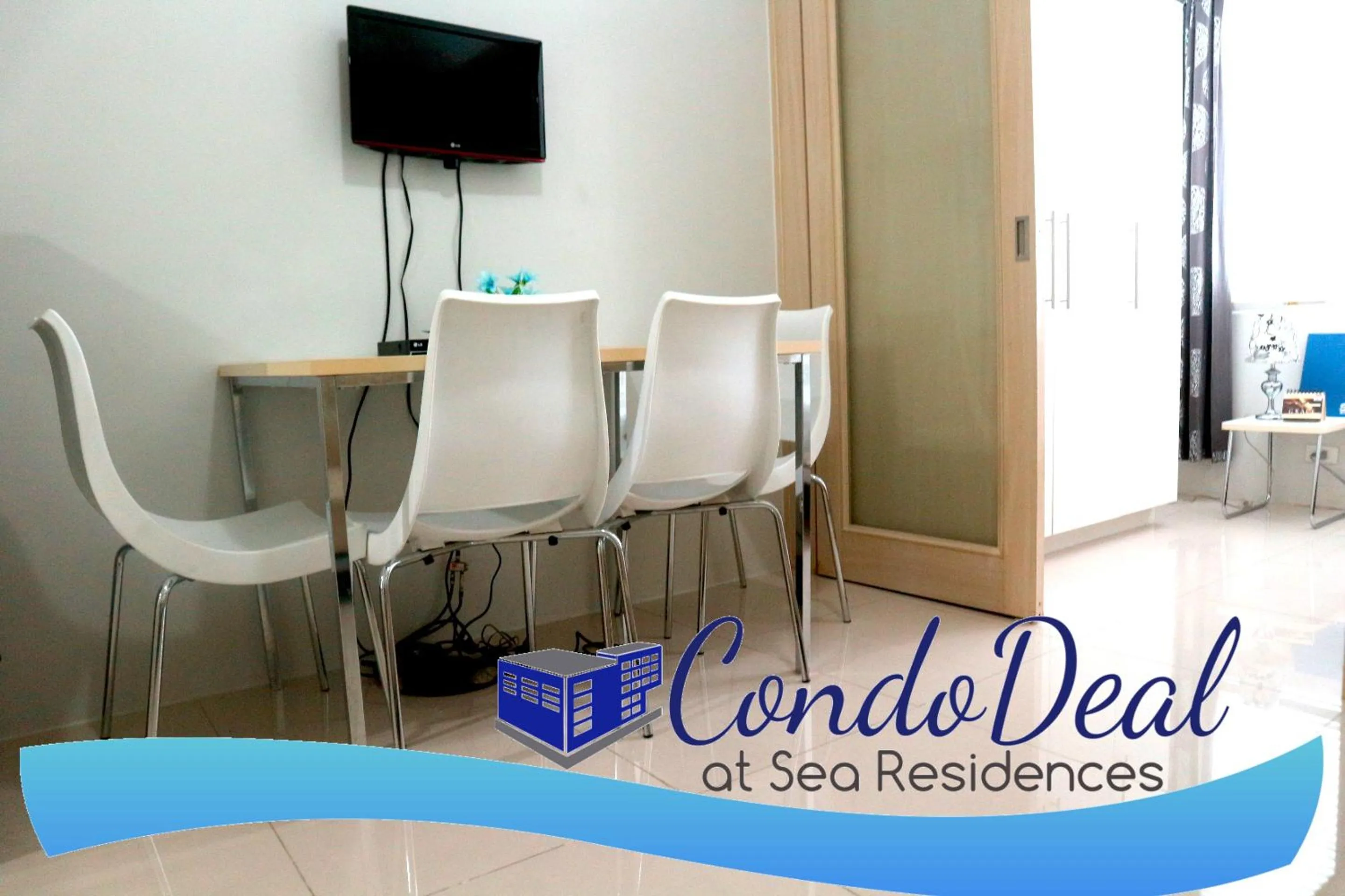 Dining area in CondoDeal at Sea Residences