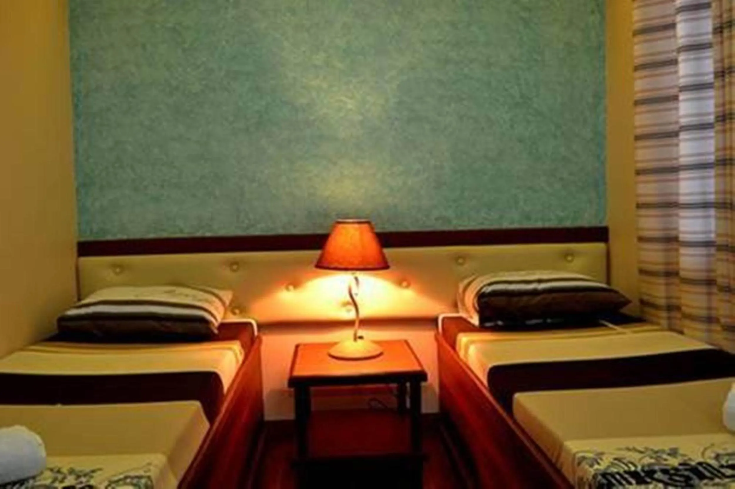 Bed in Julieta's Pension House