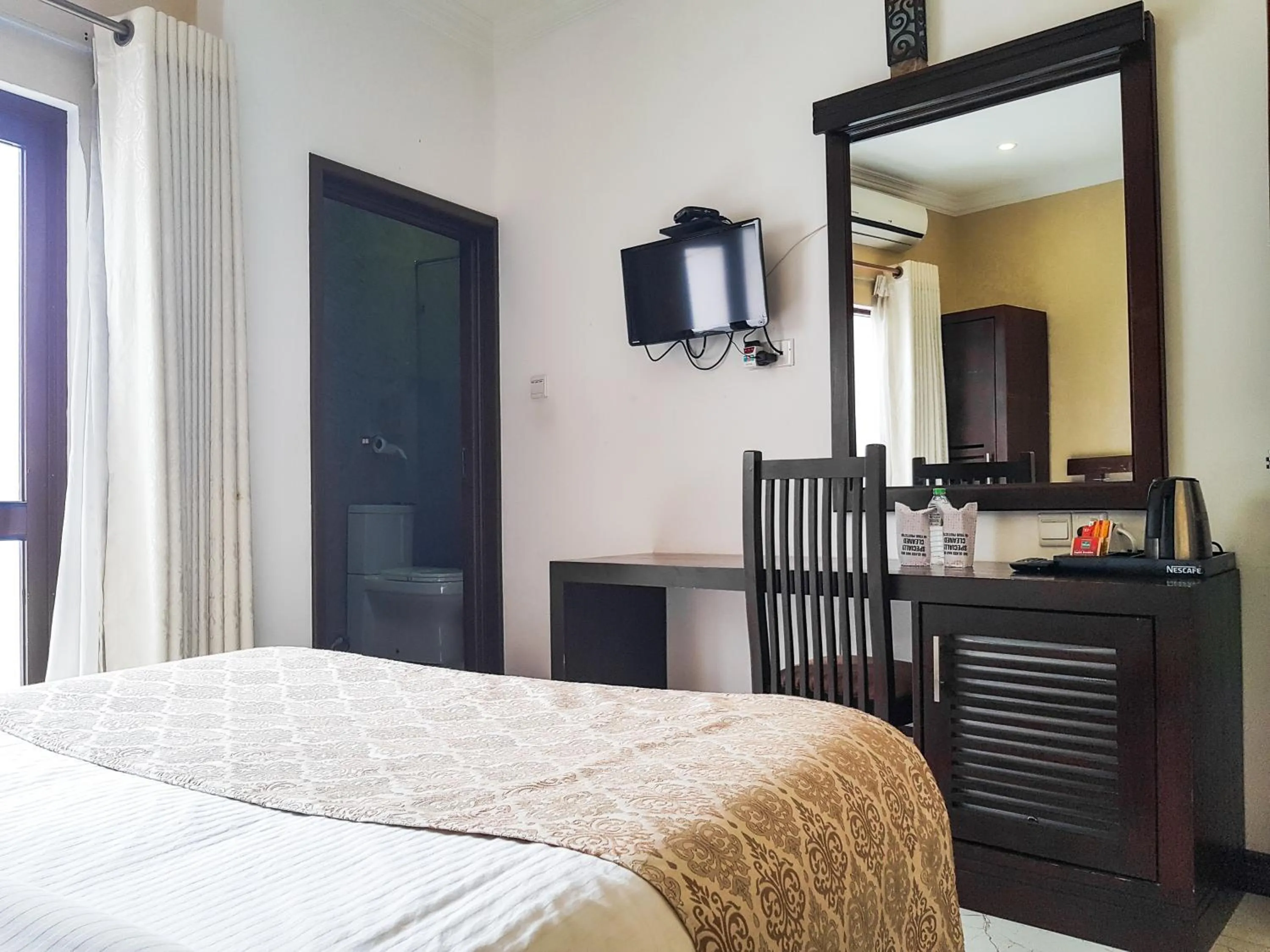 Bed in Galaxy City Hotel