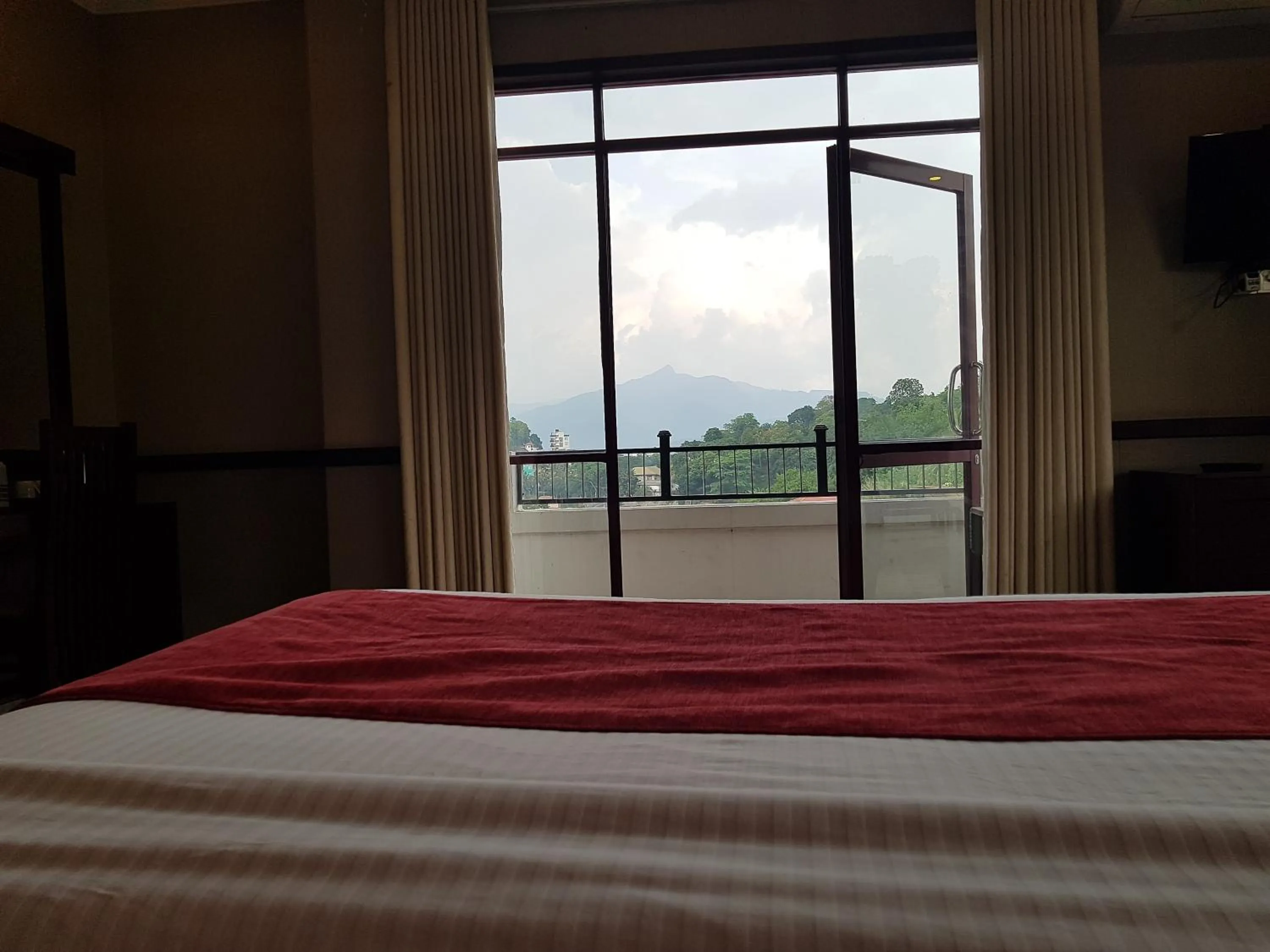 Bed in Galaxy City Hotel