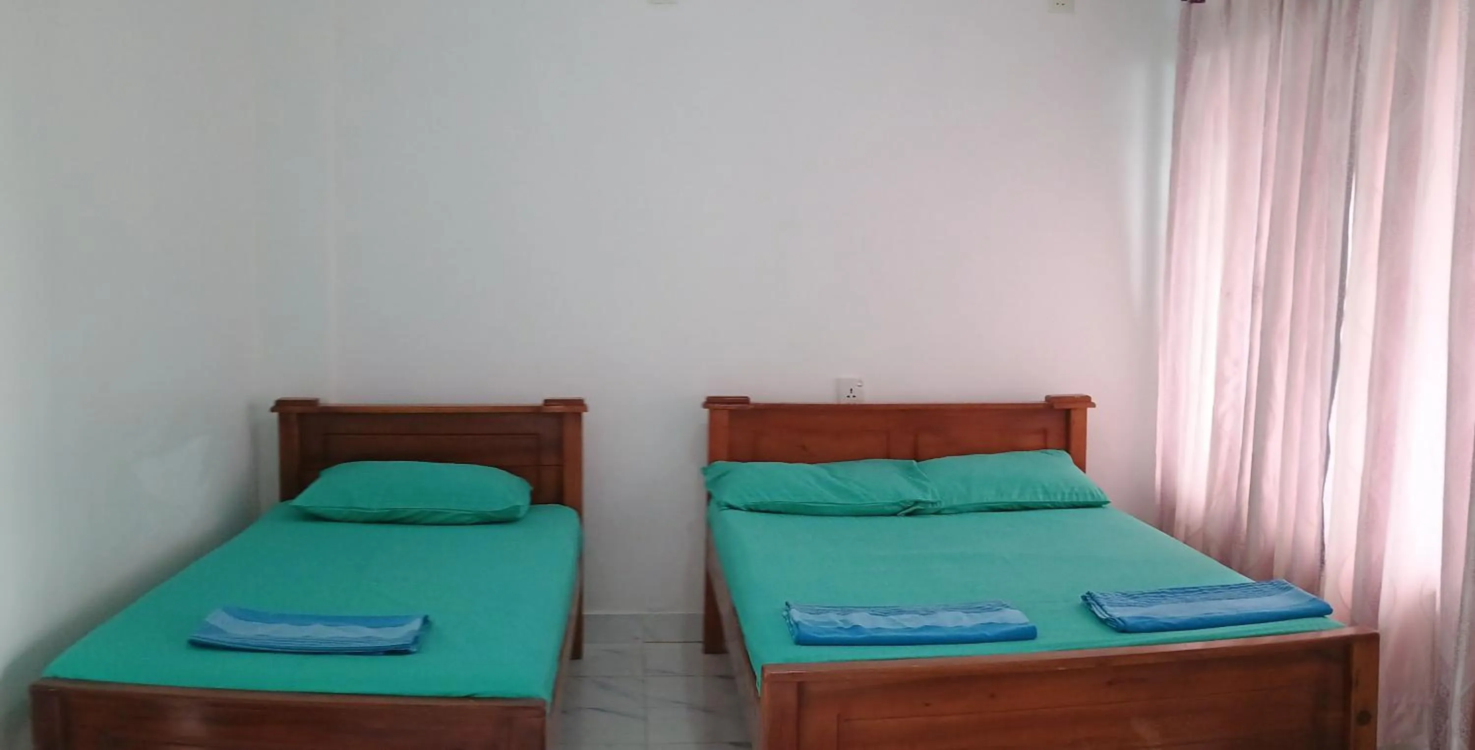 Bed in Green View Holiday Resort