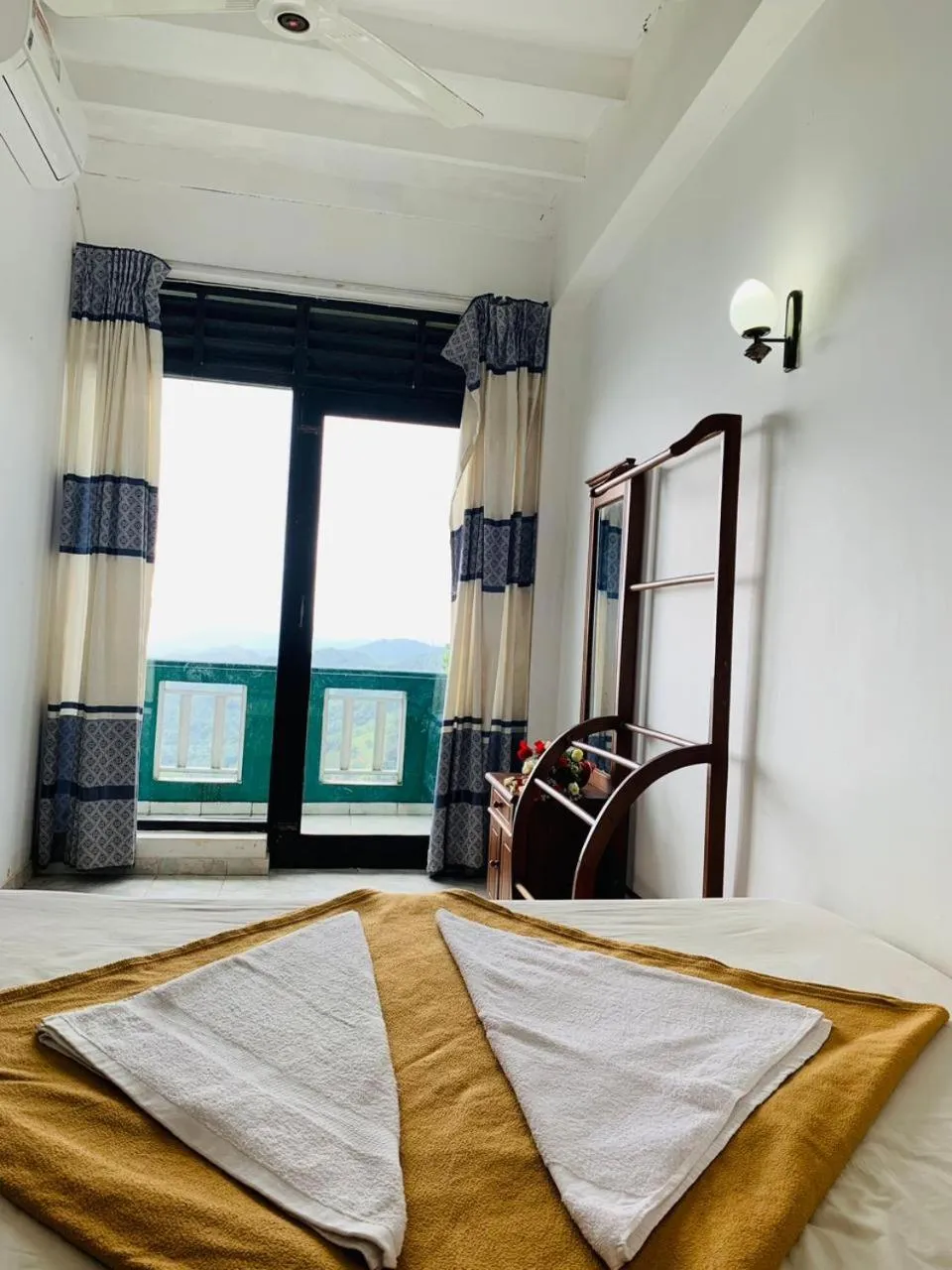 Seating area, Bed in Green View Holiday Resort