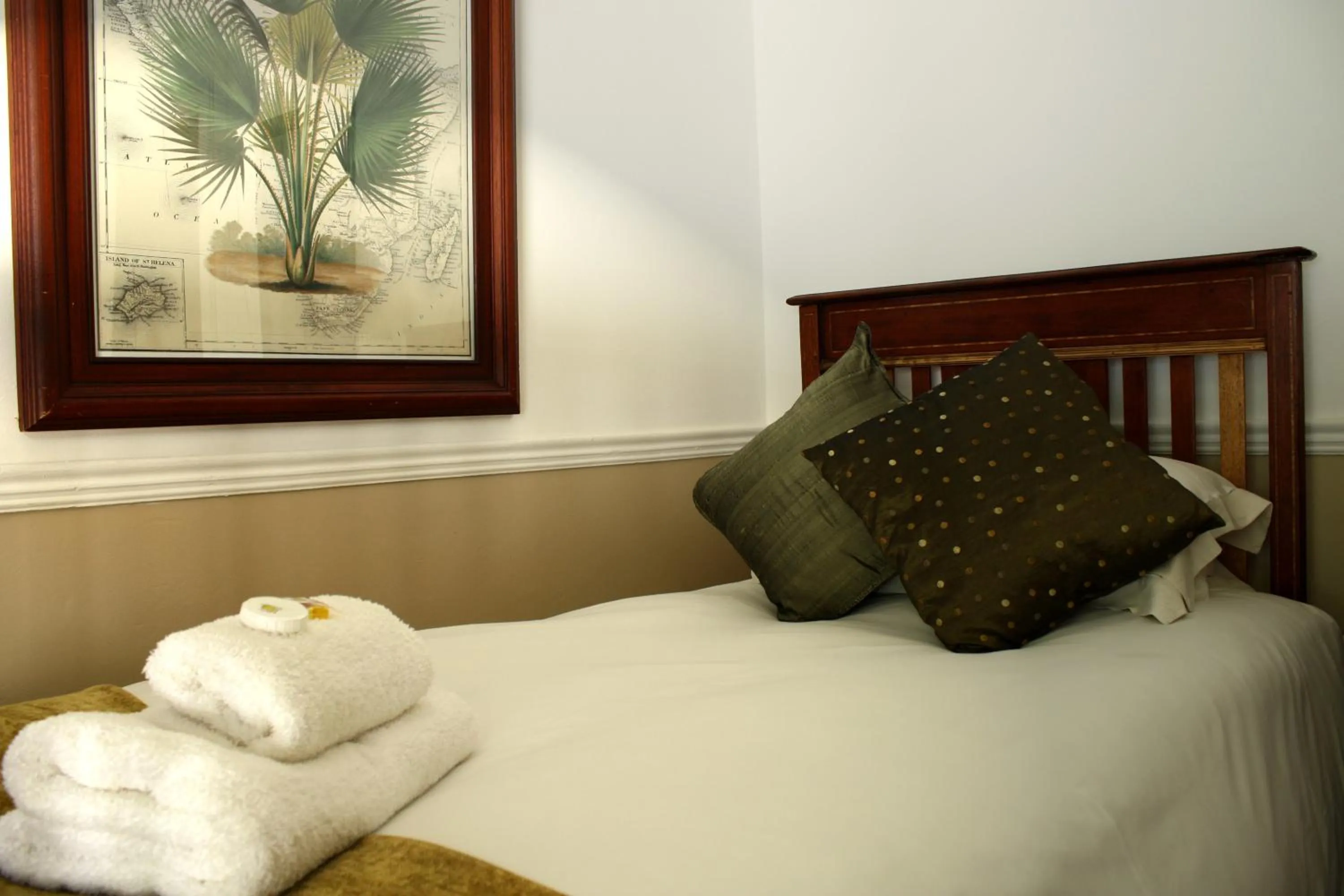 Bed in Lemon & Lime Guesthouse