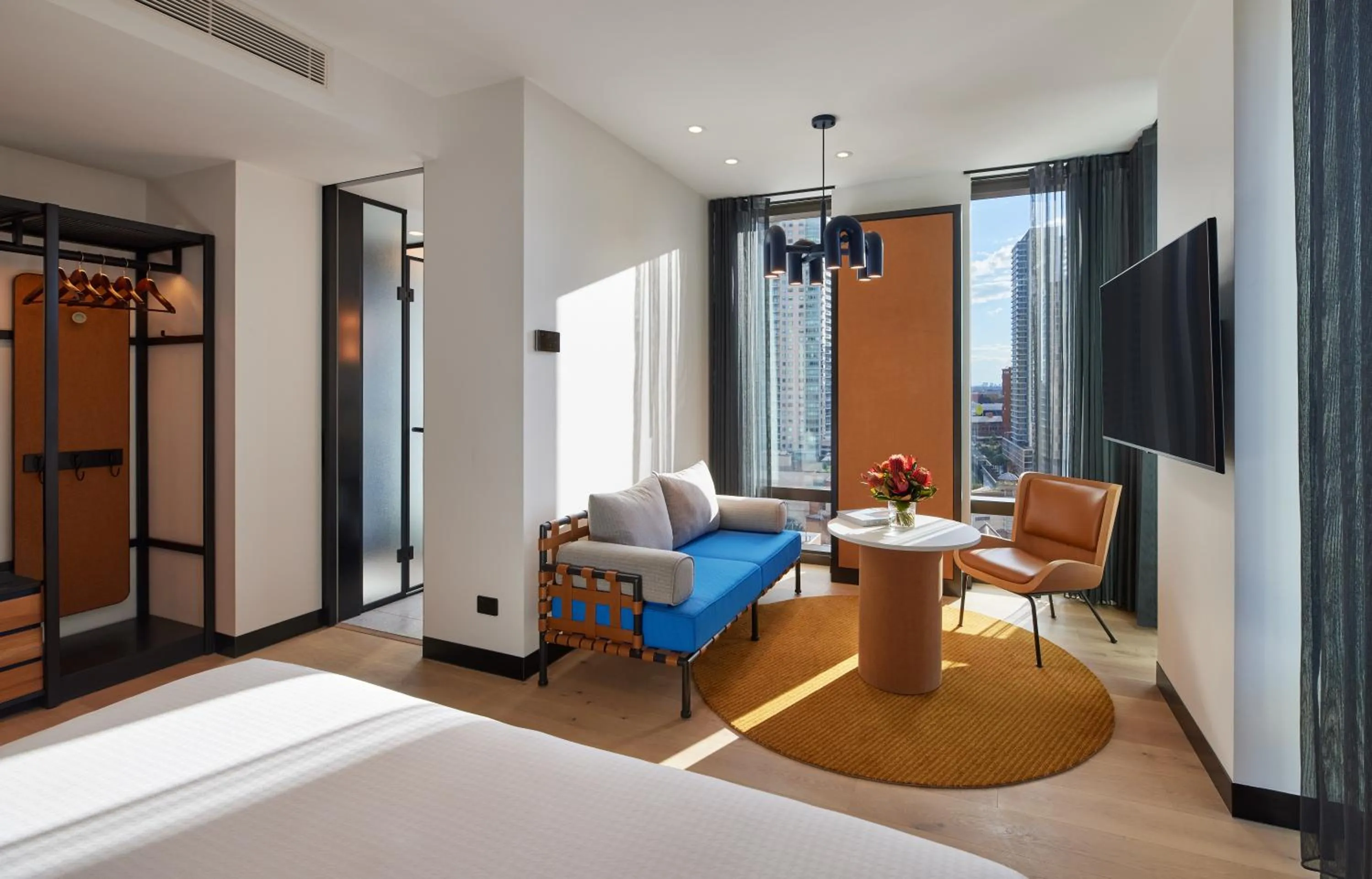 Seating area, Bed in Caption By Hyatt Central Sydney