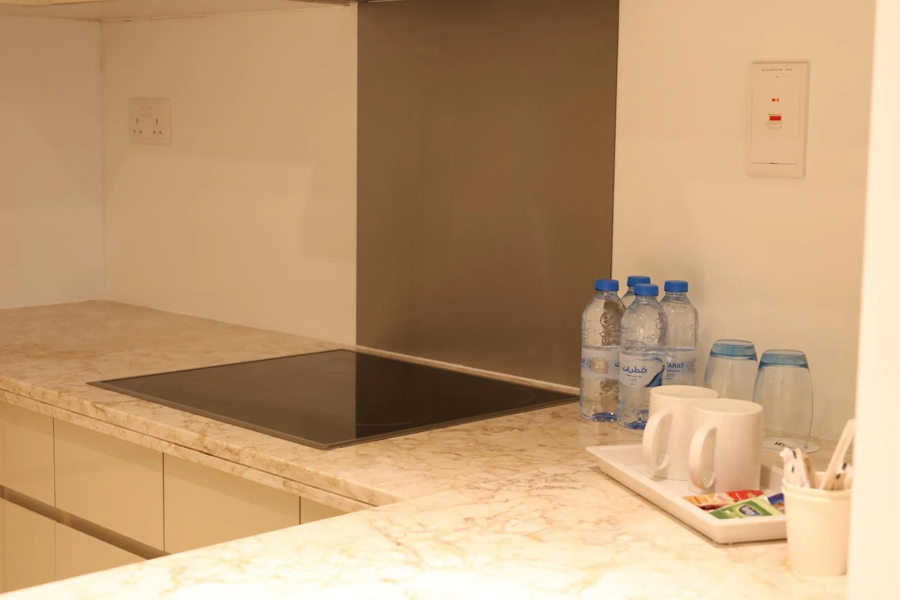 Kitchen or kitchenette in Westpac Hotel & Suites - Westbay Doha