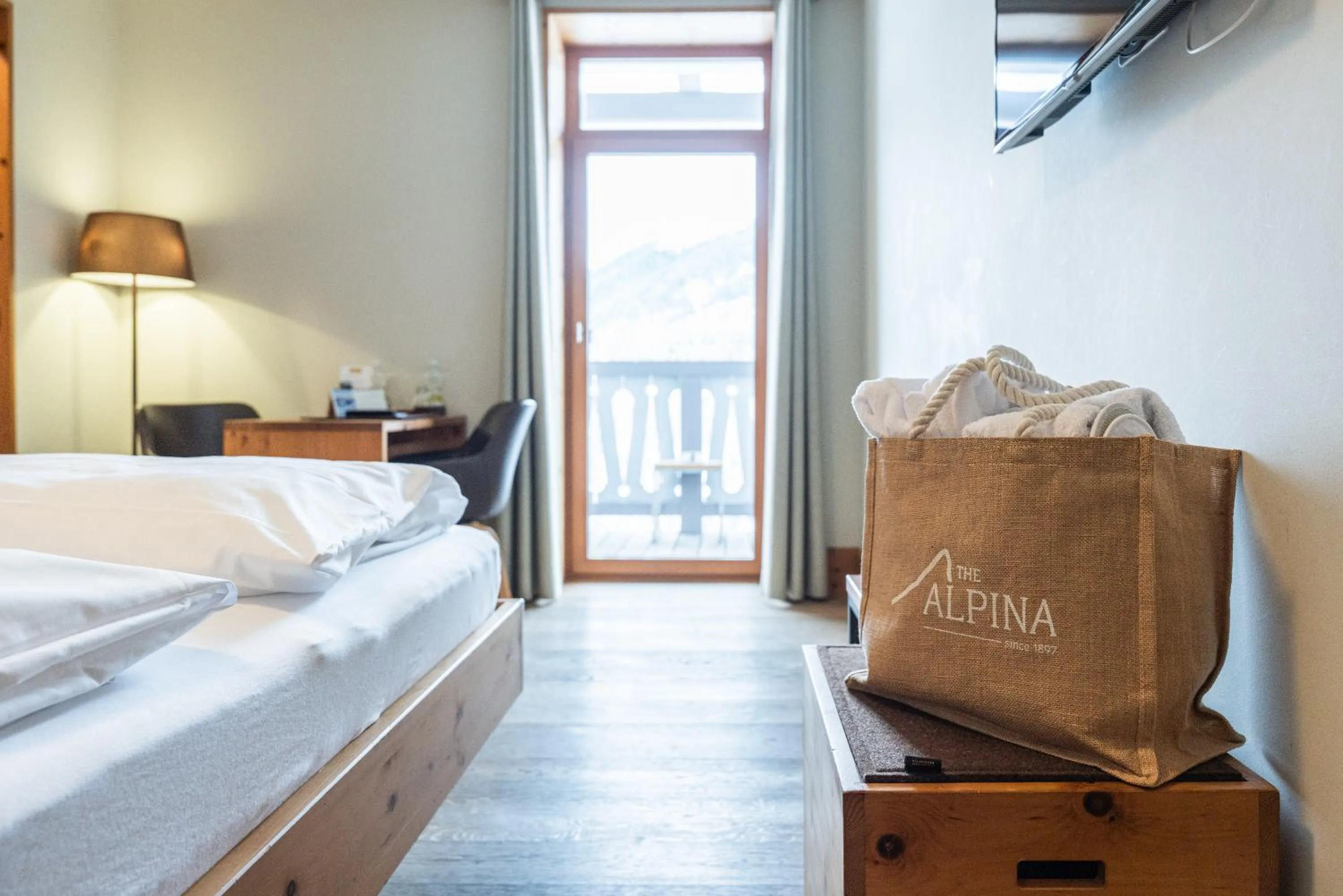 Photo of the whole room, Bed in The Alpina Mountain Resort