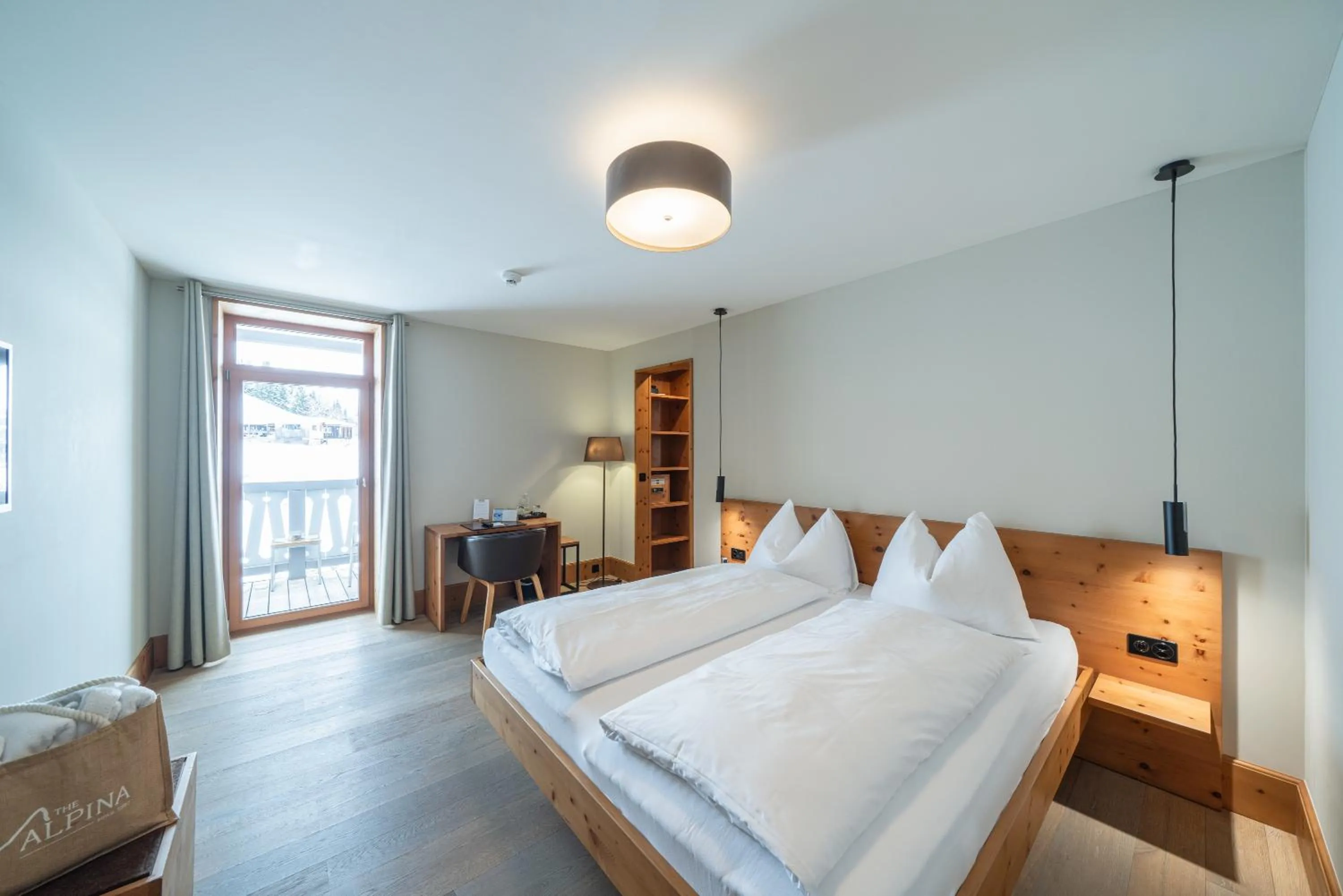 Photo of the whole room, Bed in The Alpina Mountain Resort