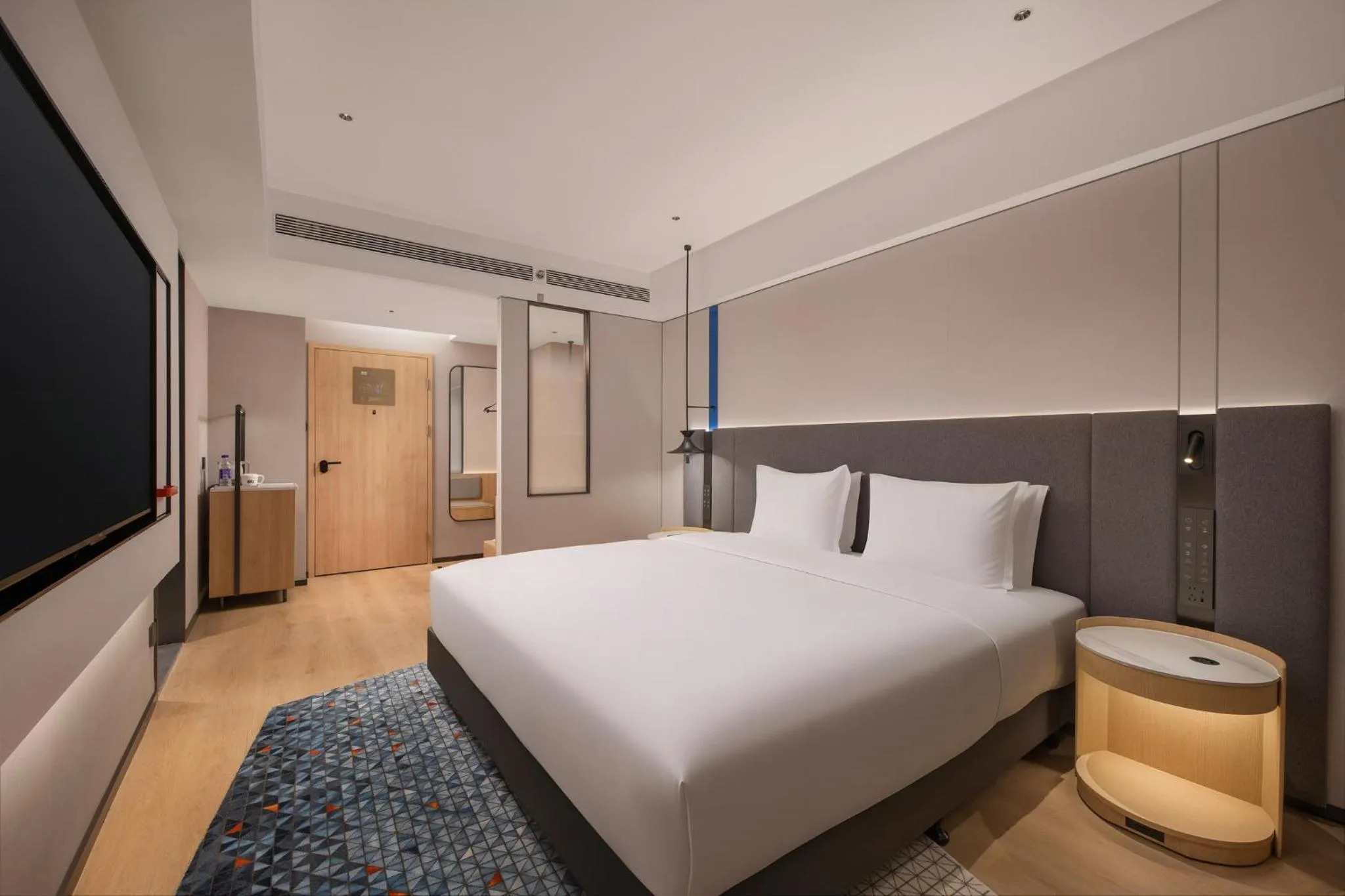 Photo of the whole room, Bed in Holiday Inn Express Rizhao Oriental Colorful City