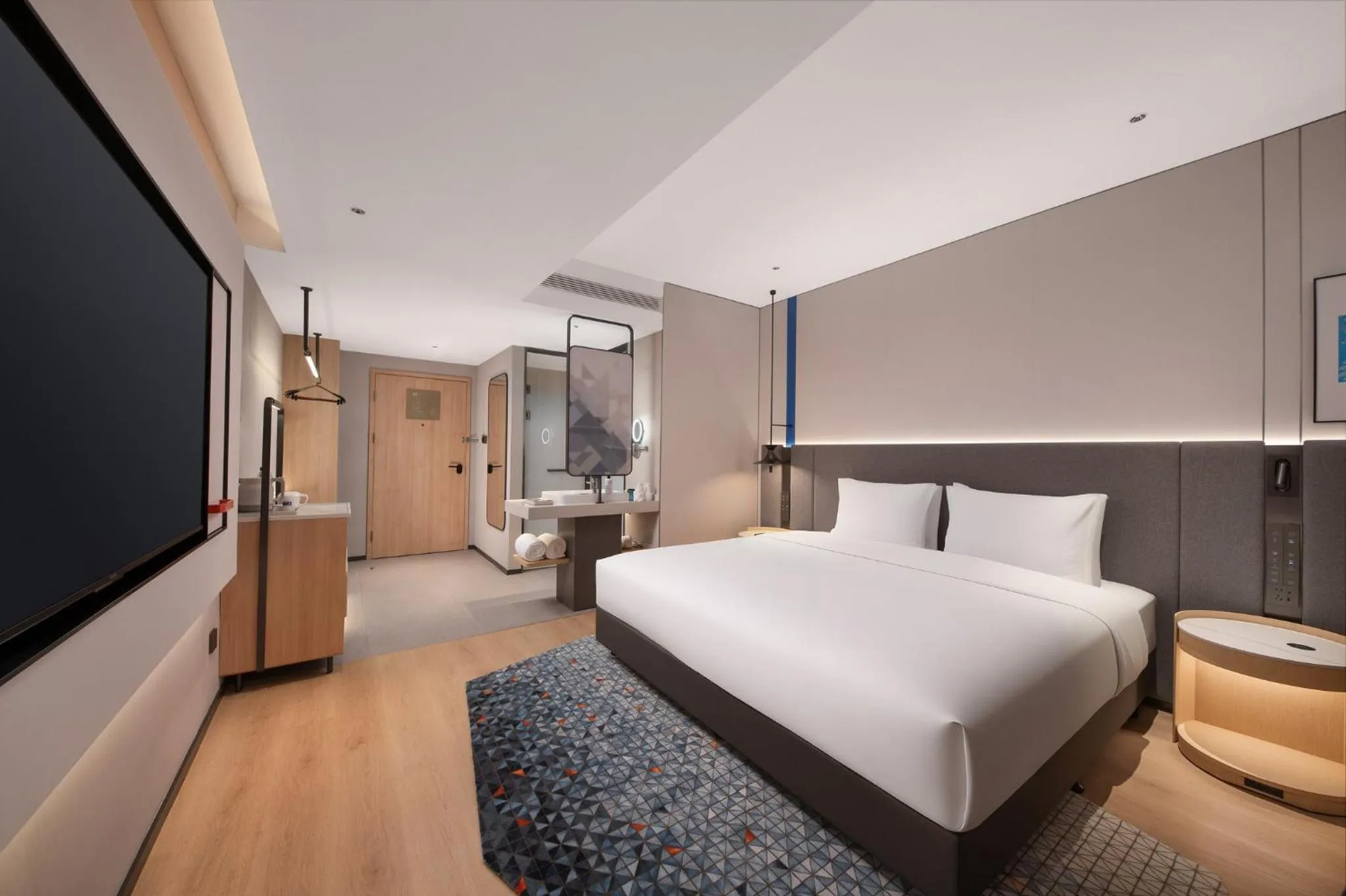 Photo of the whole room, Bed in Holiday Inn Express Rizhao Oriental Colorful City