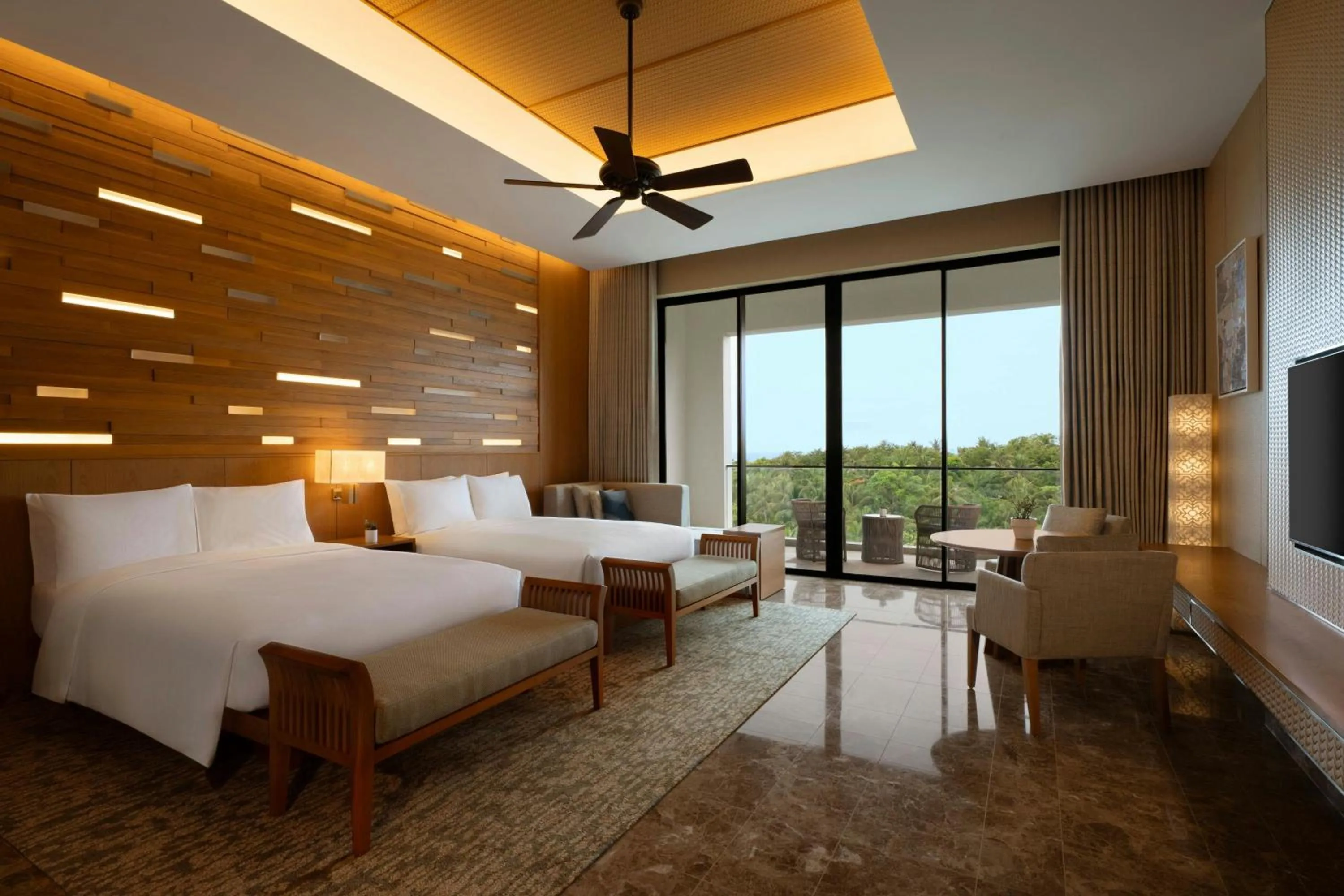 Photo of the whole room, Bed in JW Marriott Cam Ranh Bay Resort & Spa