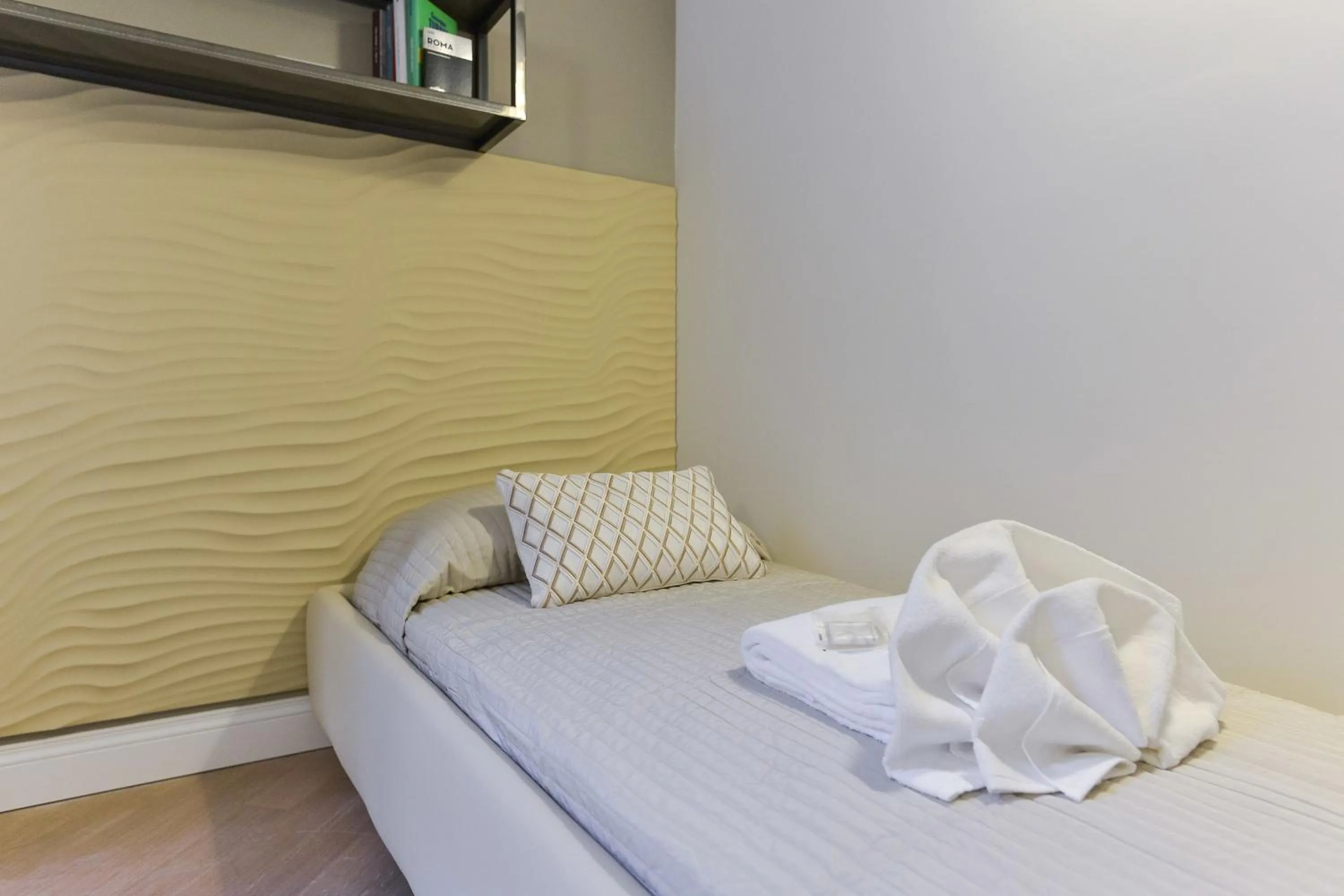 Bed in EVE Luxury Apartments Pantheon