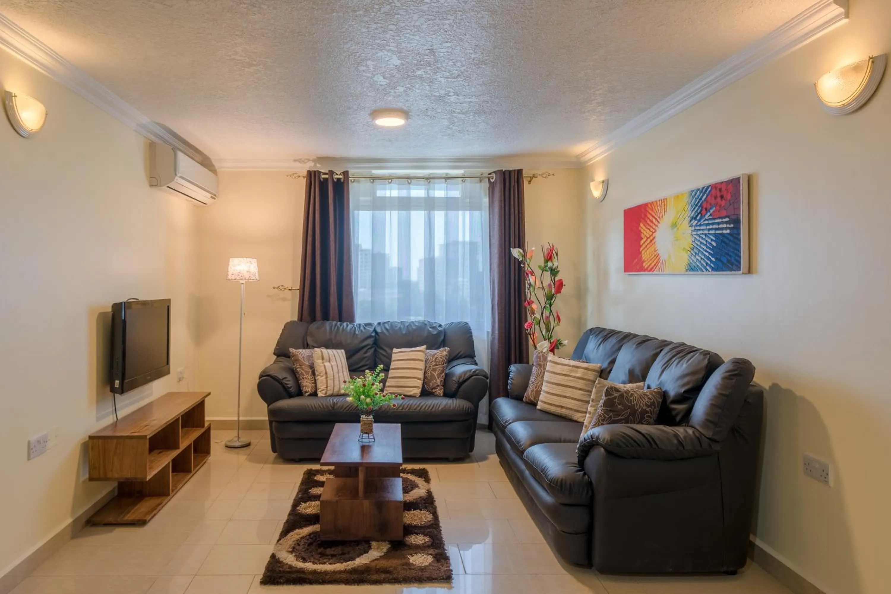 TV and multimedia in Hotel Raha Tower