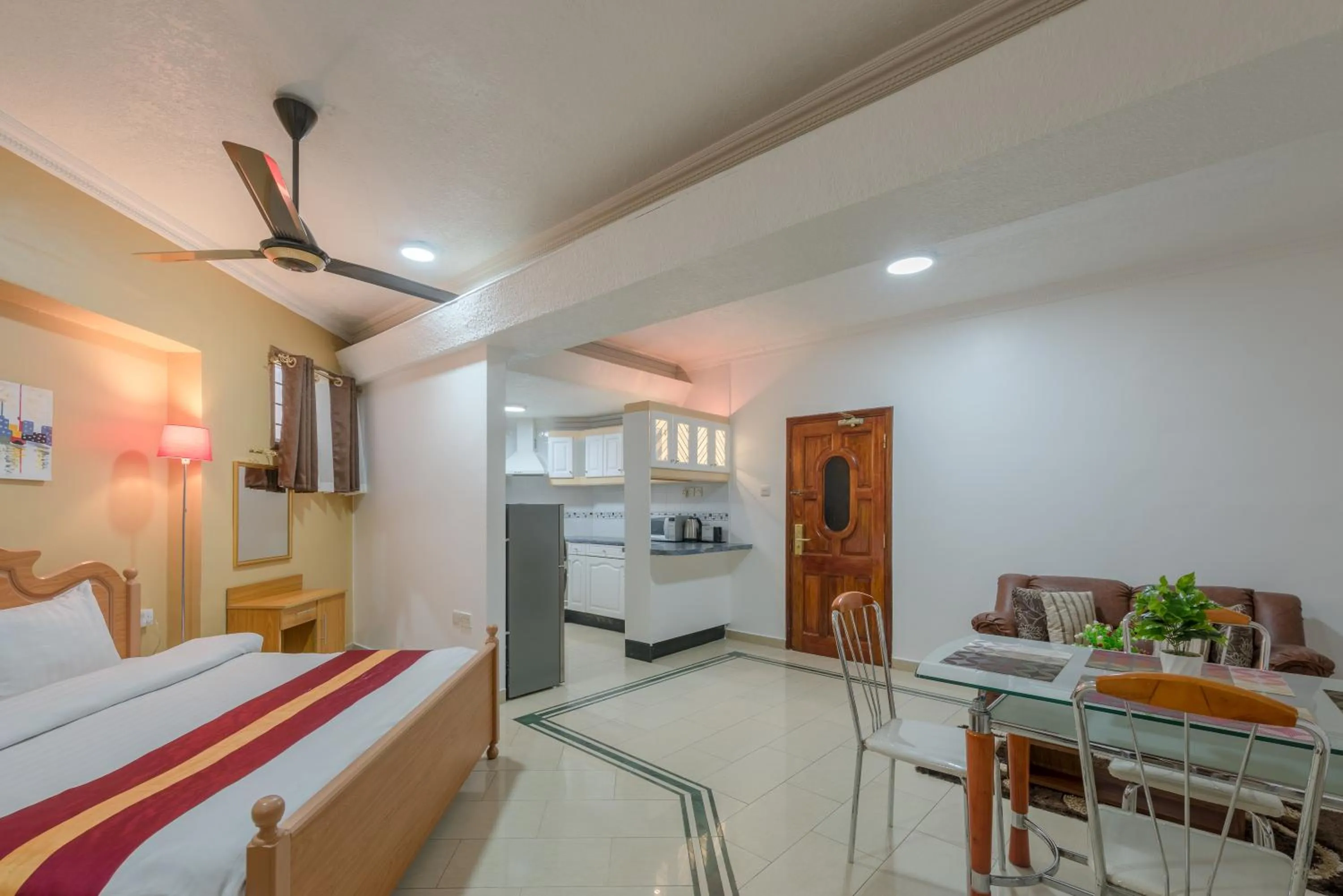 Bed in Hotel Raha Tower