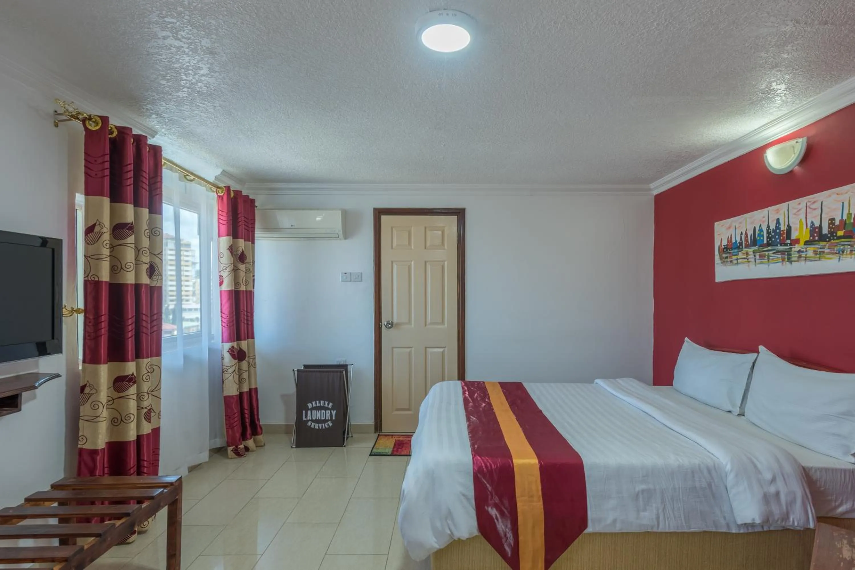 Bed in Hotel Raha Tower