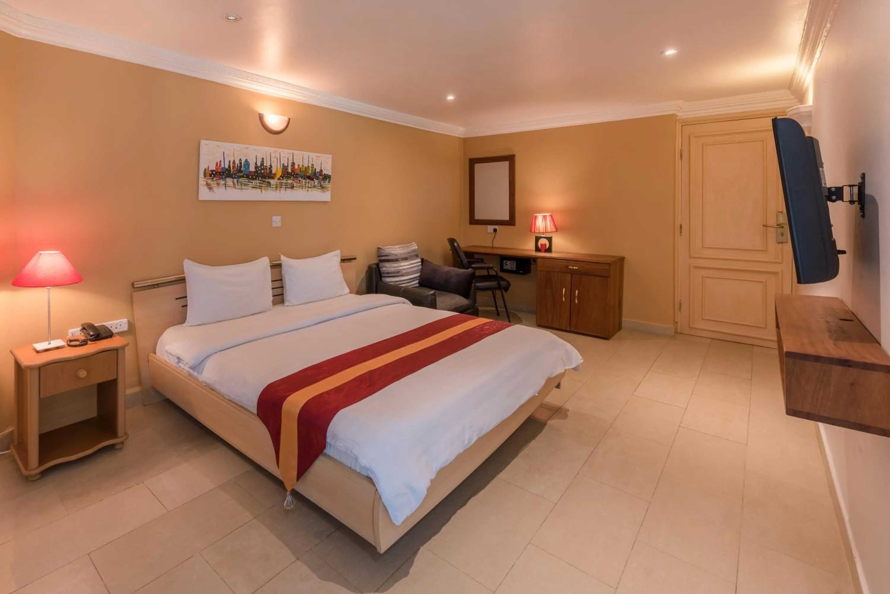 Bed in Hotel Raha Tower