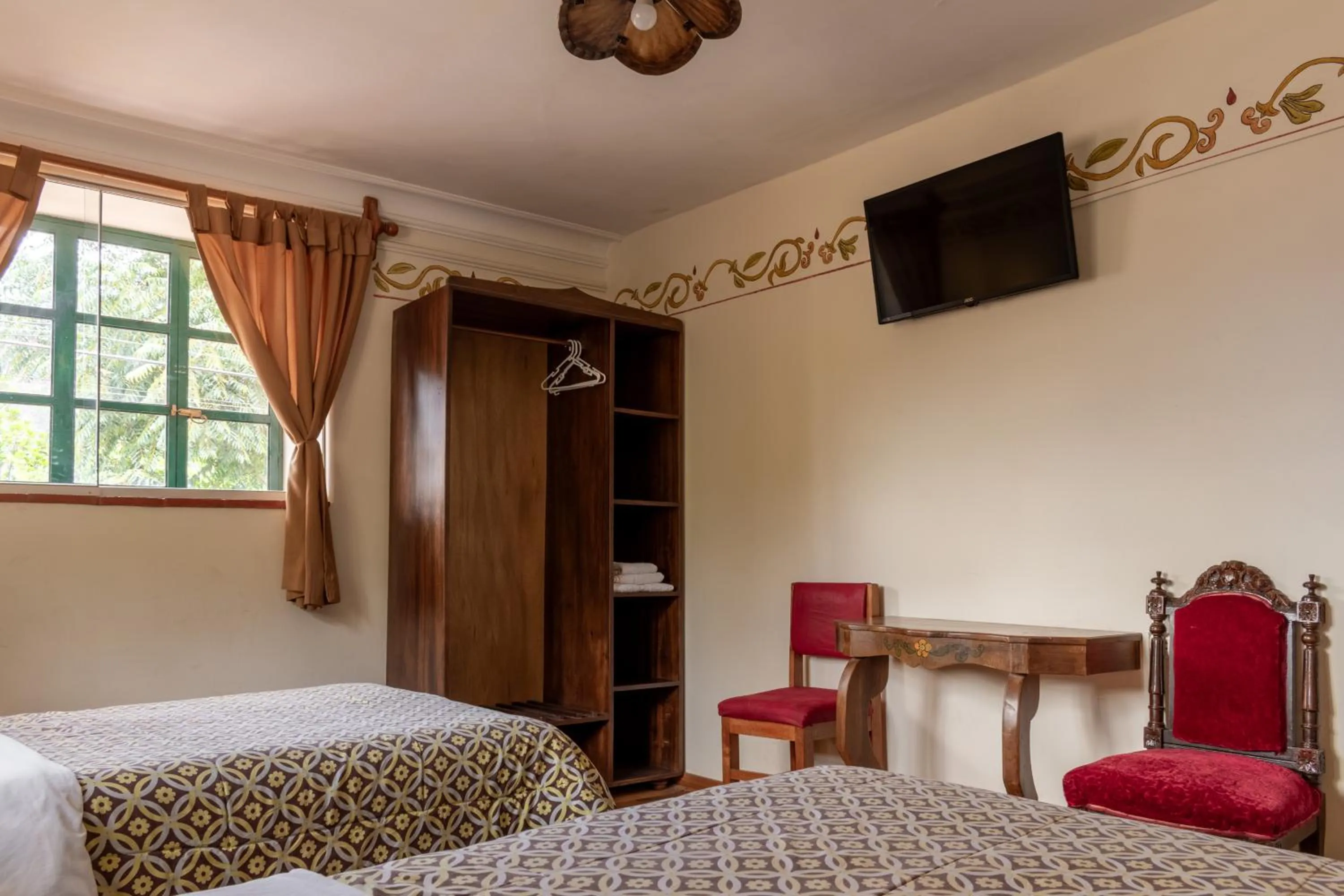 TV and multimedia, Bed in Hospedaje La Florida