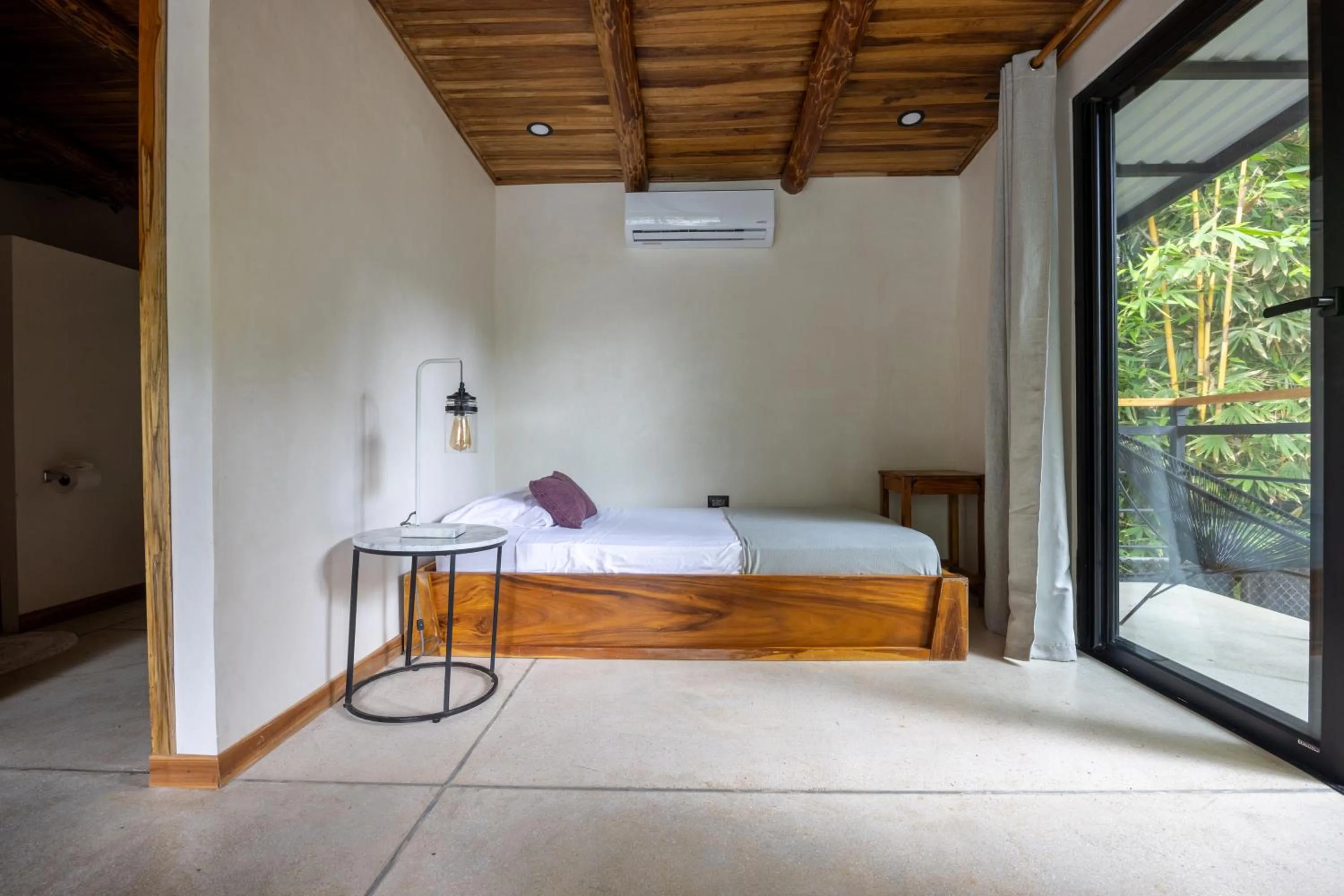 Bed in Believe Surf & Yoga Lodge Santa Teresa