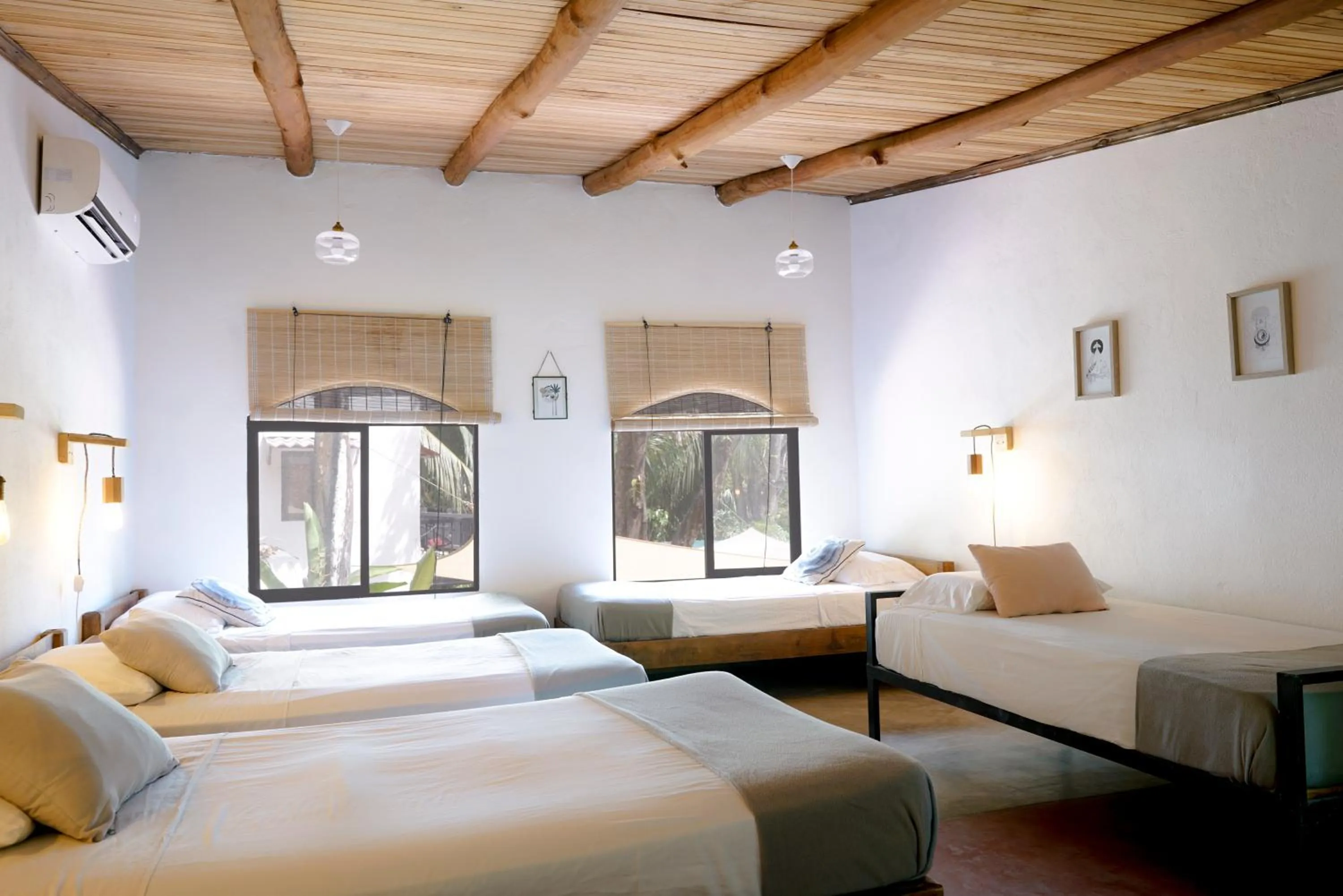 air conditioner, Bed in Believe Surf & Yoga Lodge Santa Teresa