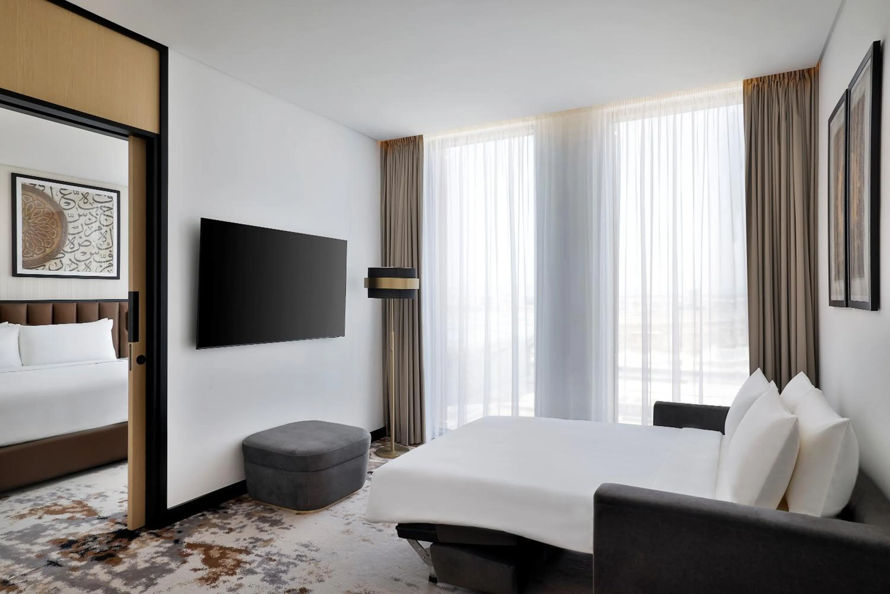 Living room, Bed in DoubleTree by Hilton Madinah Gate