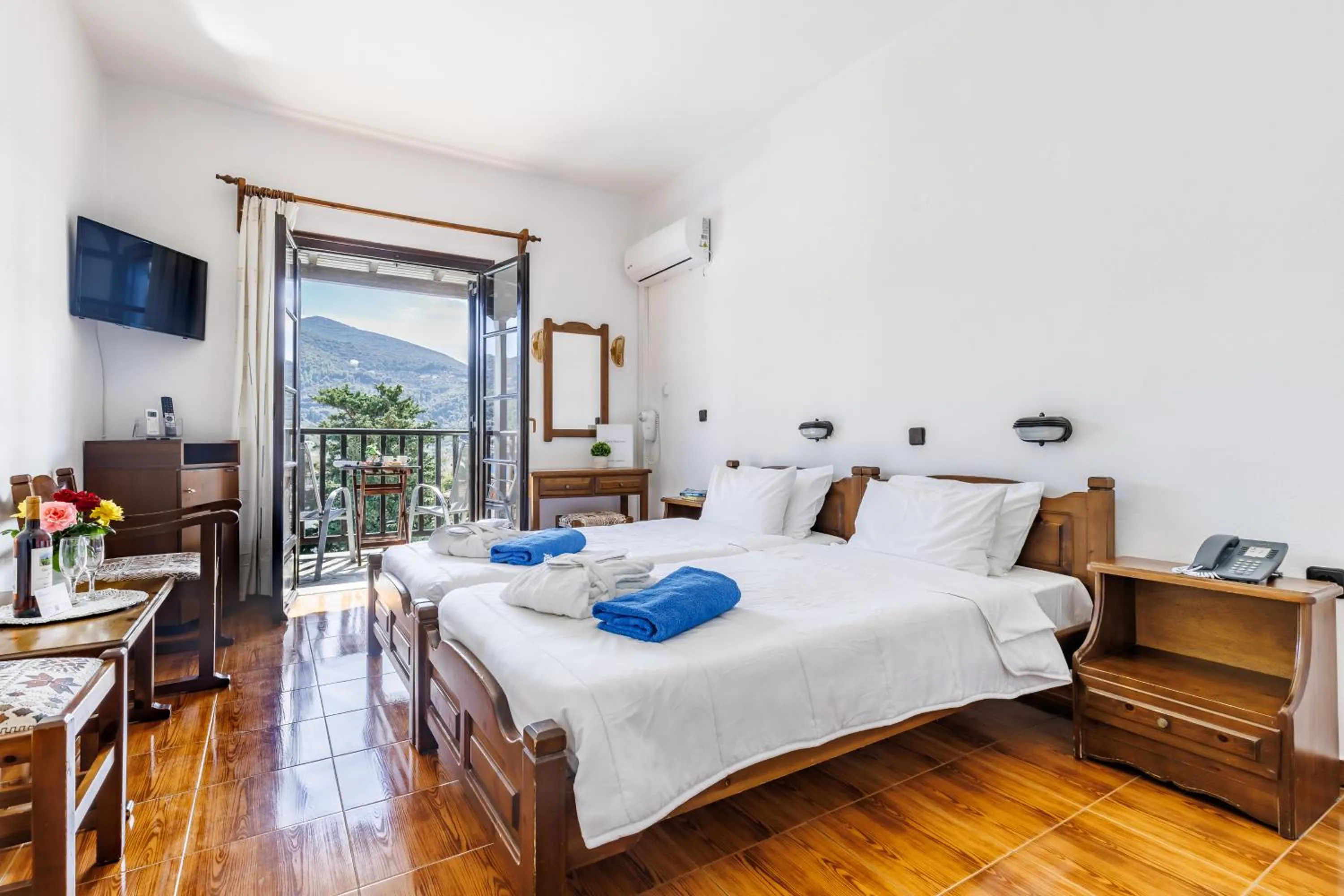 Bed in Hotel Dionyssos